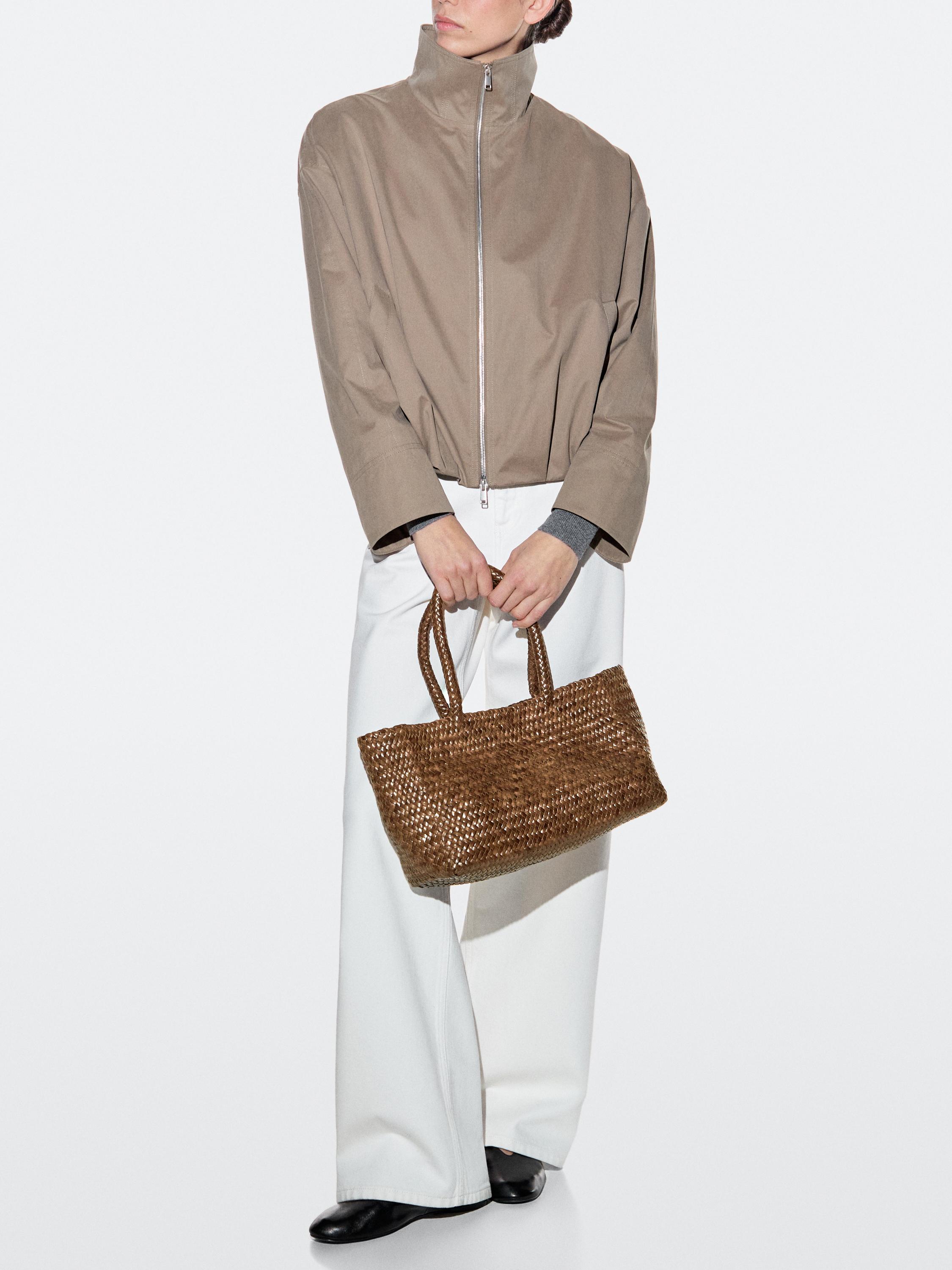 حقيبة يد متوسطة مضفرة من جلد النابا