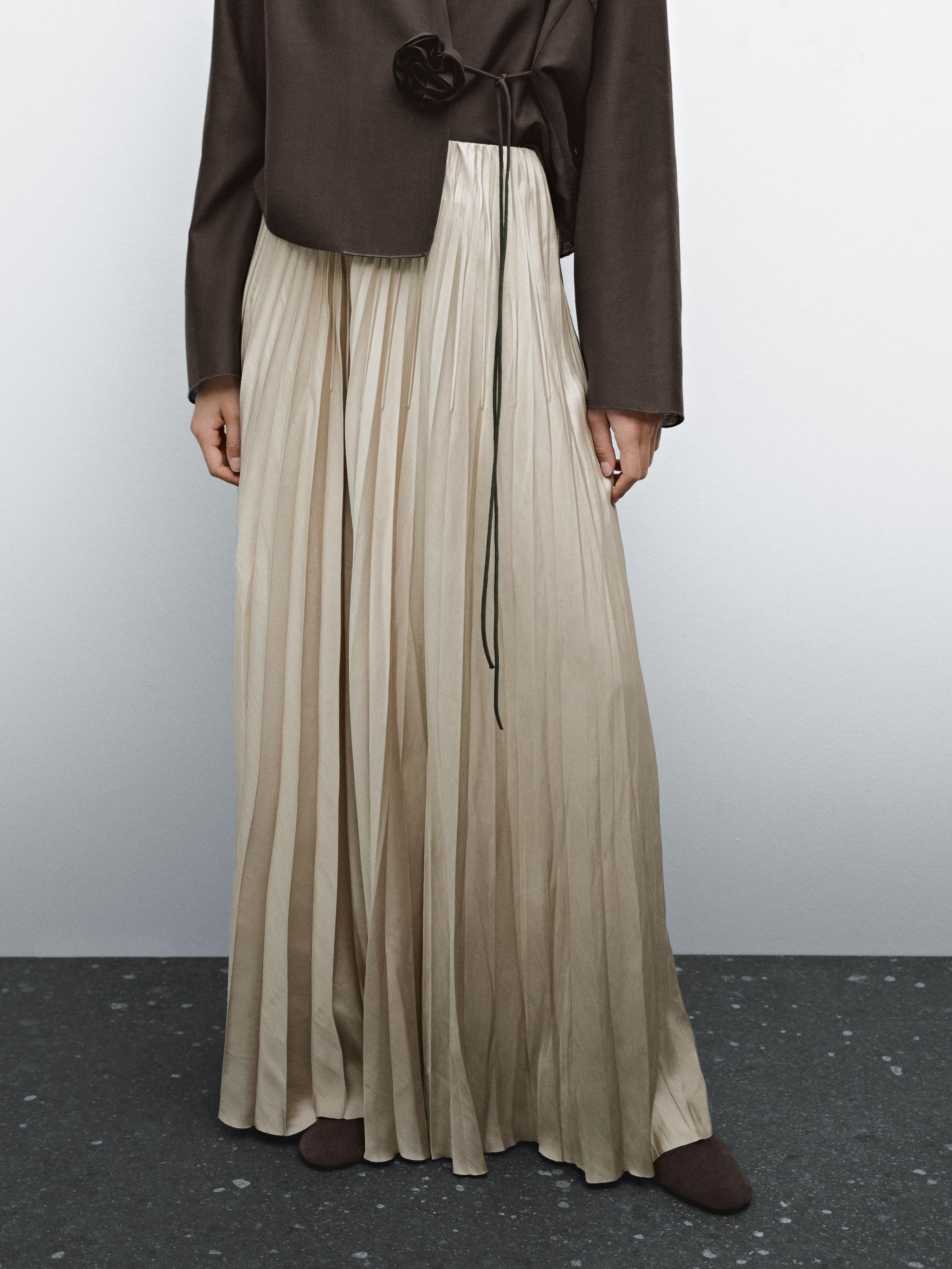 Flowing pleated satin skirt