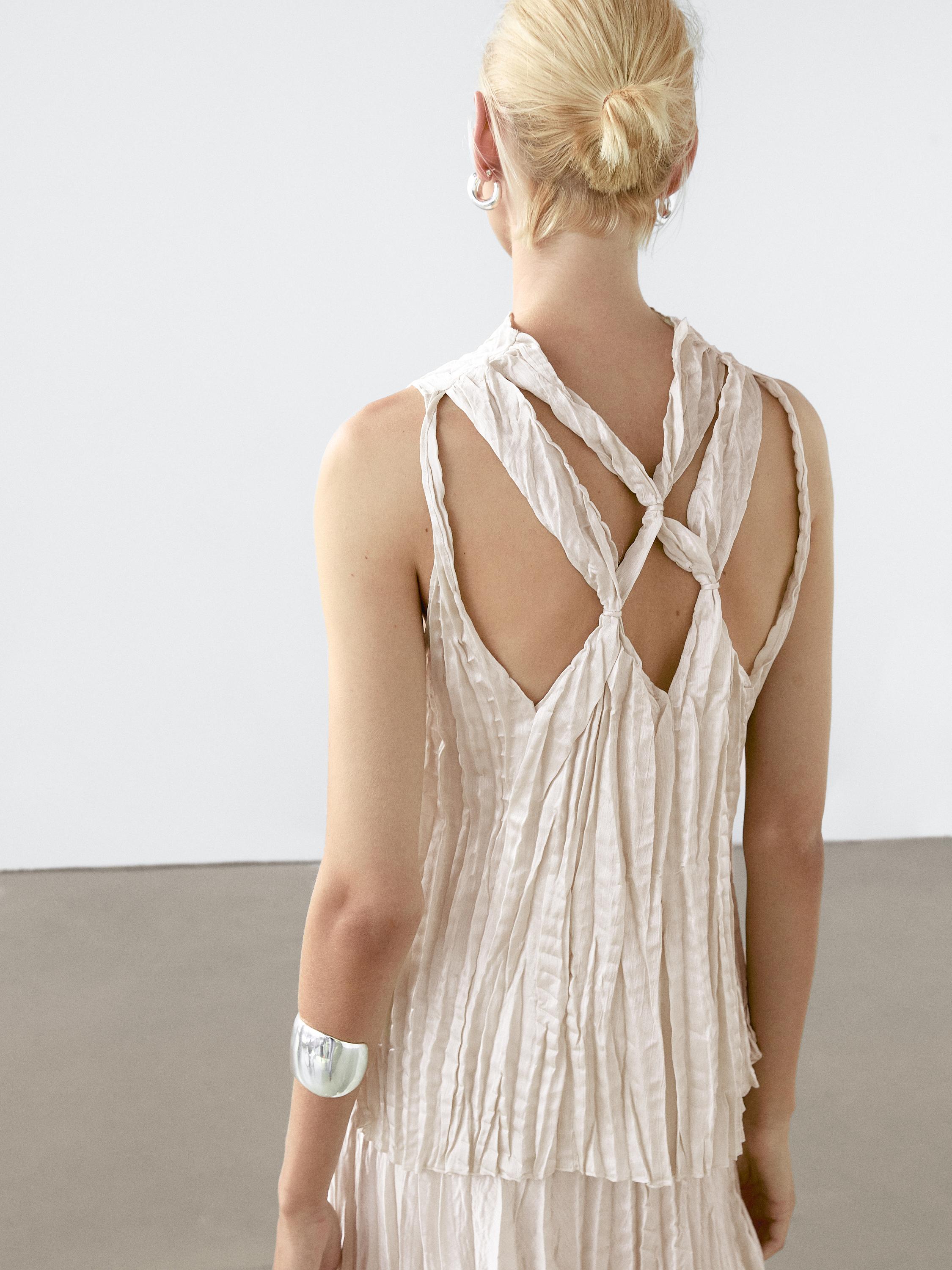 Pleated top with criss-cross back