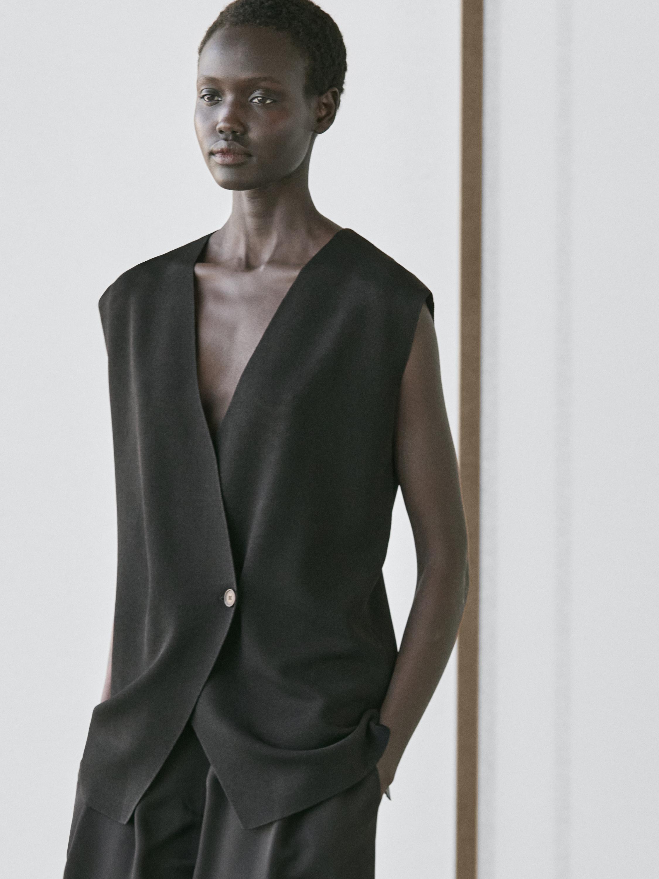 Long double-breasted vest — BLACK