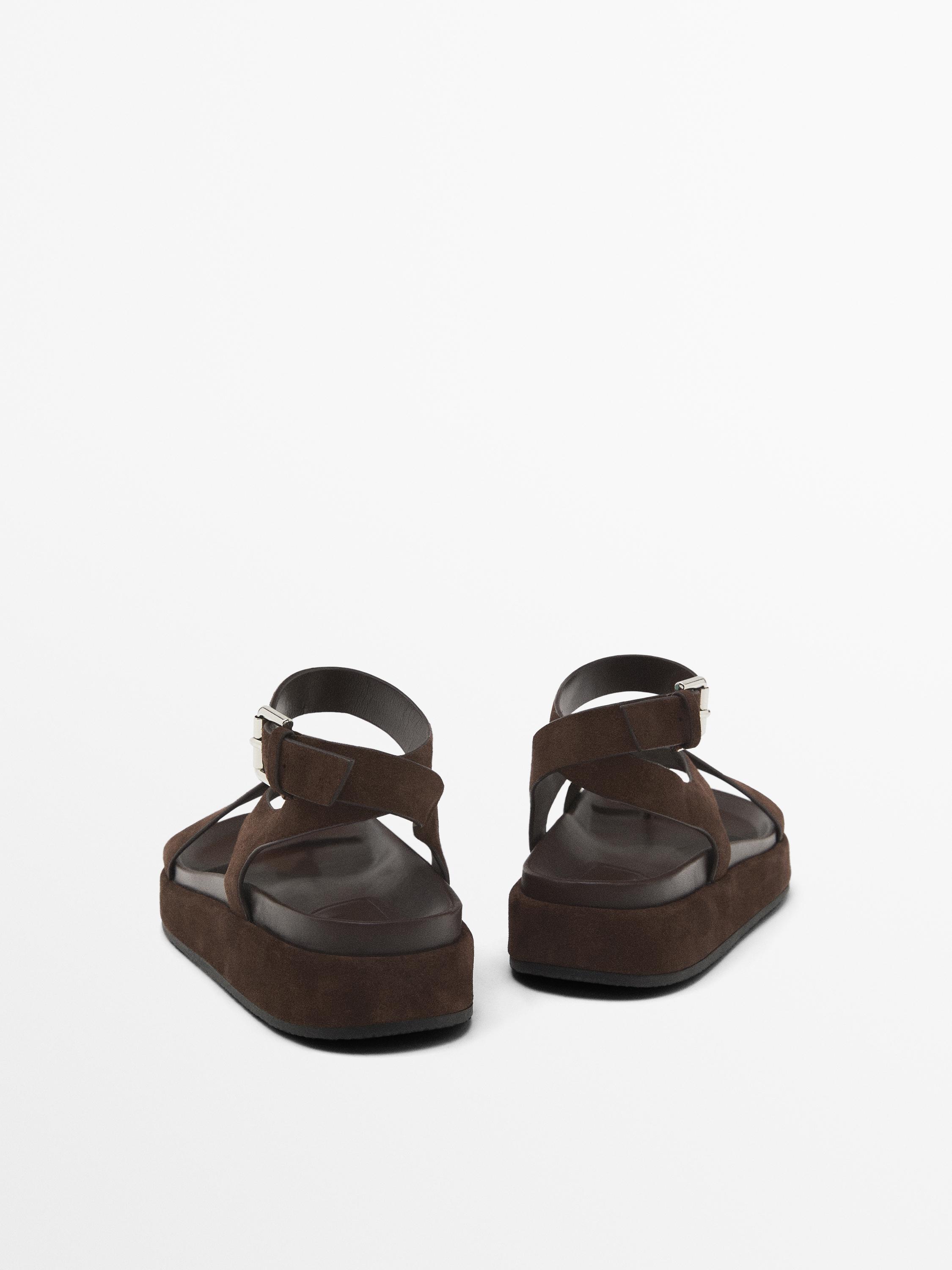 Sandals with crossover straps