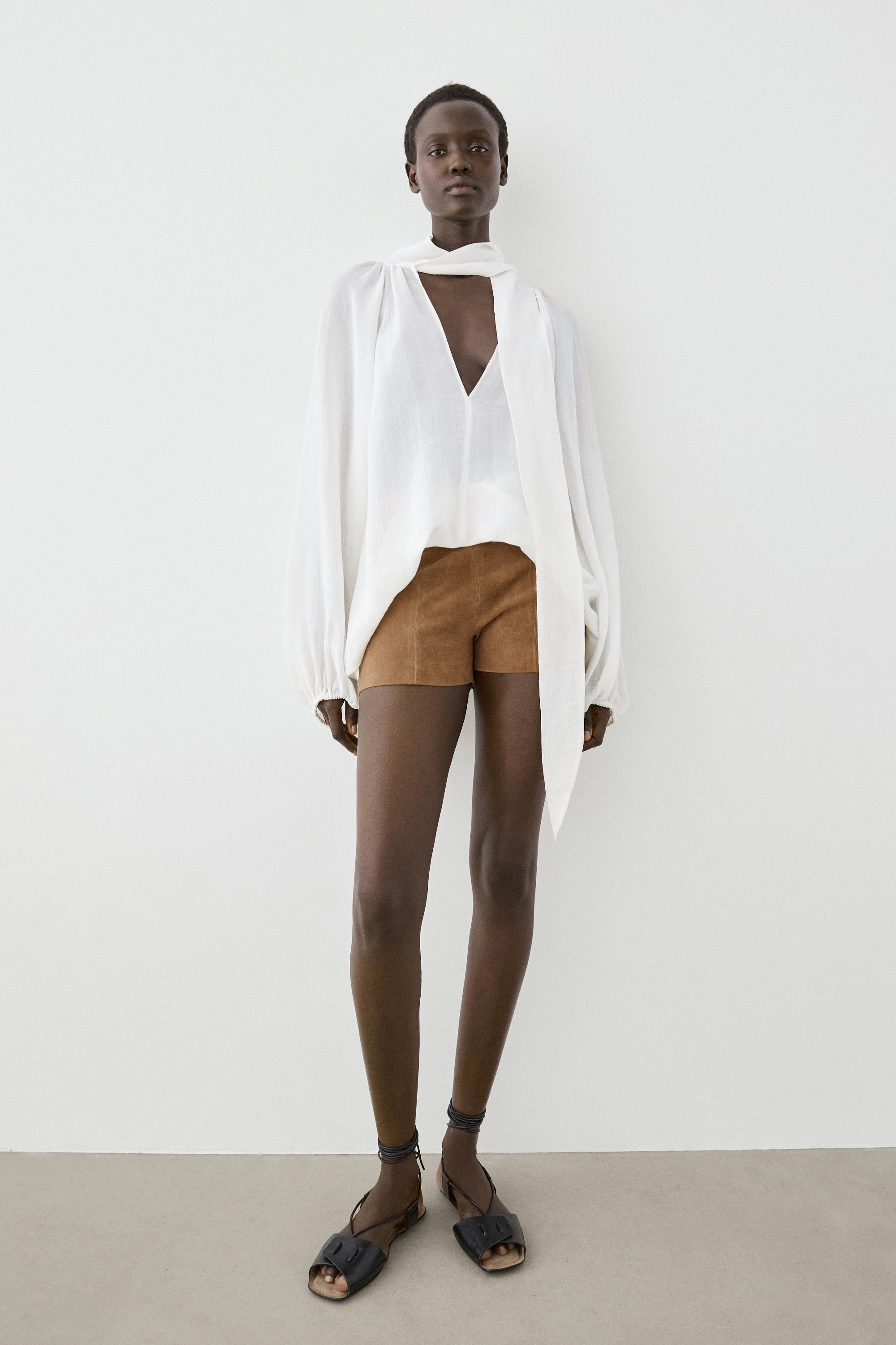 Flowing V-neck blouse with tie — WHITE