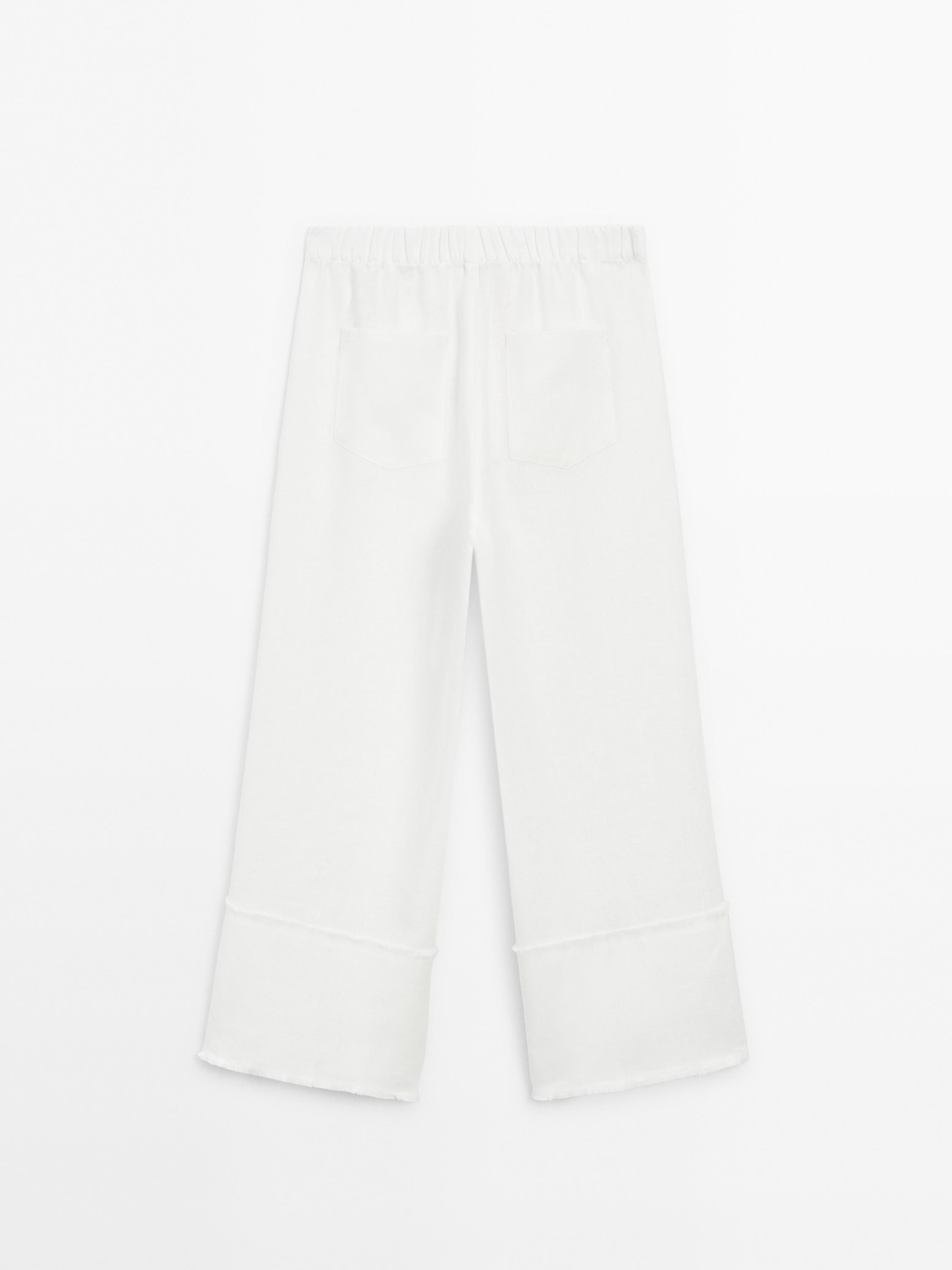 Wide leg trousers with flared detail