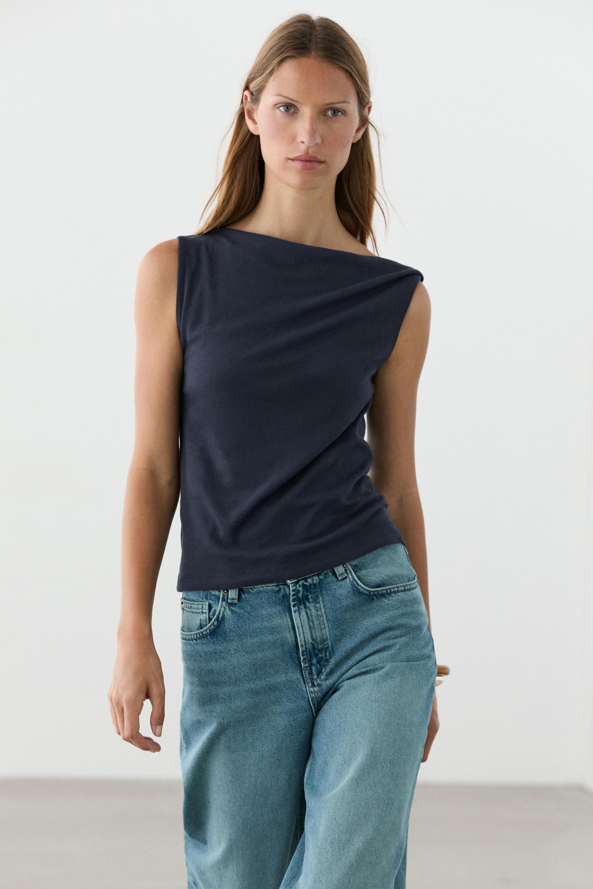 Asymmetric drop sleeve top