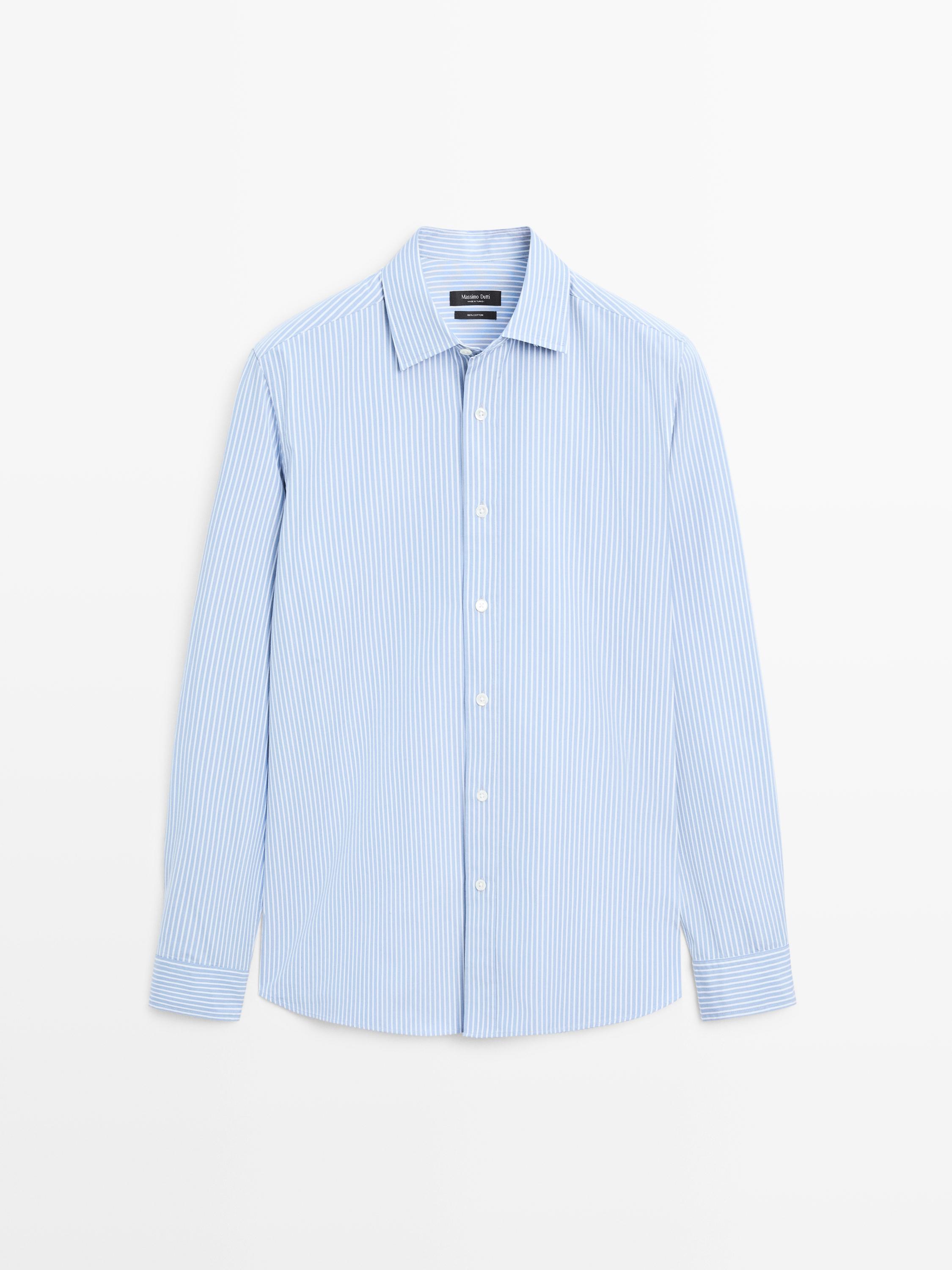 Front view of a medium blue shirt with thin stripes, long sleeves, a classic collar, and a central button placket.