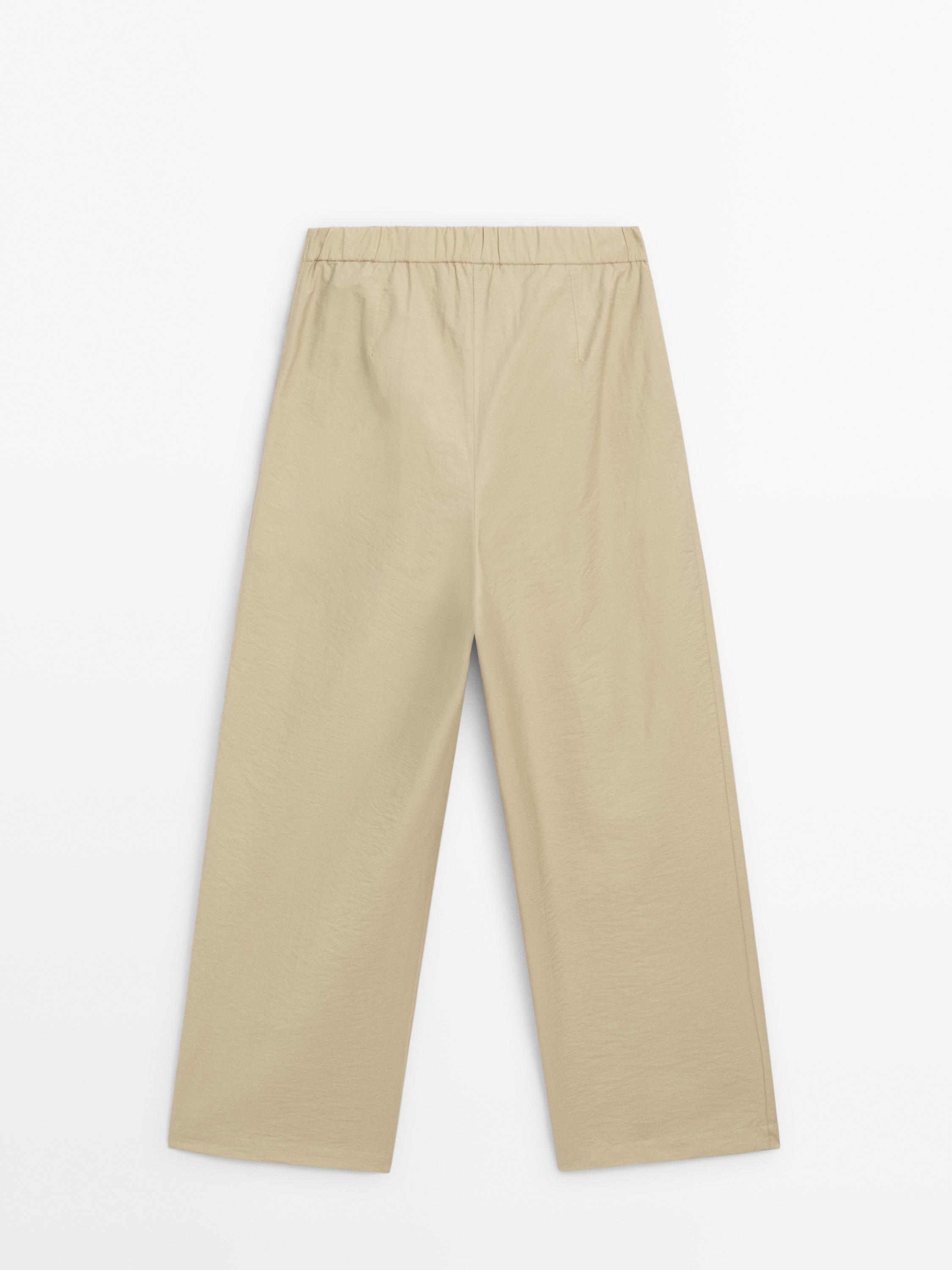 Wide-leg pleated co-ord trousers