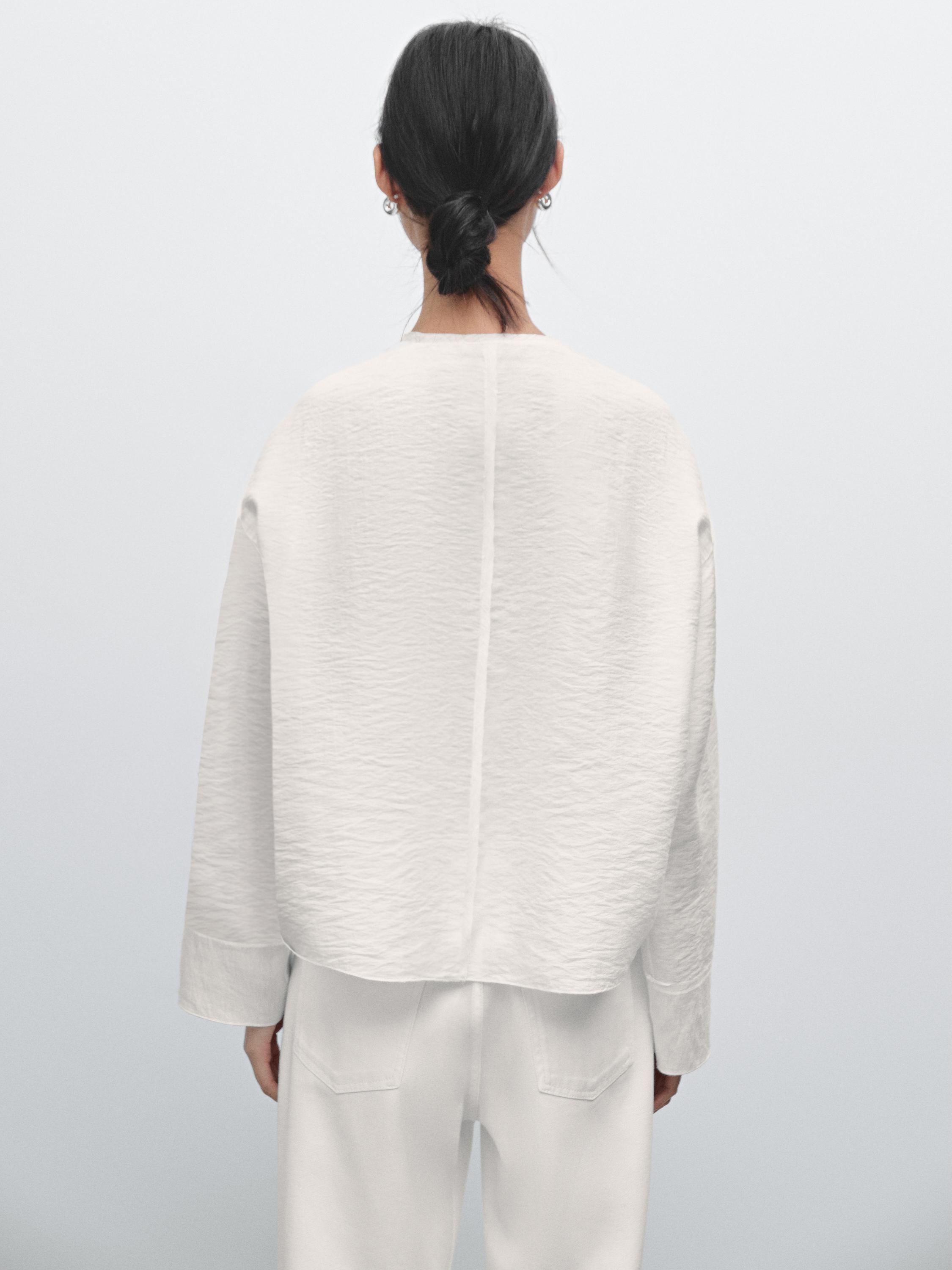 Flowing shirt with embroidered detail