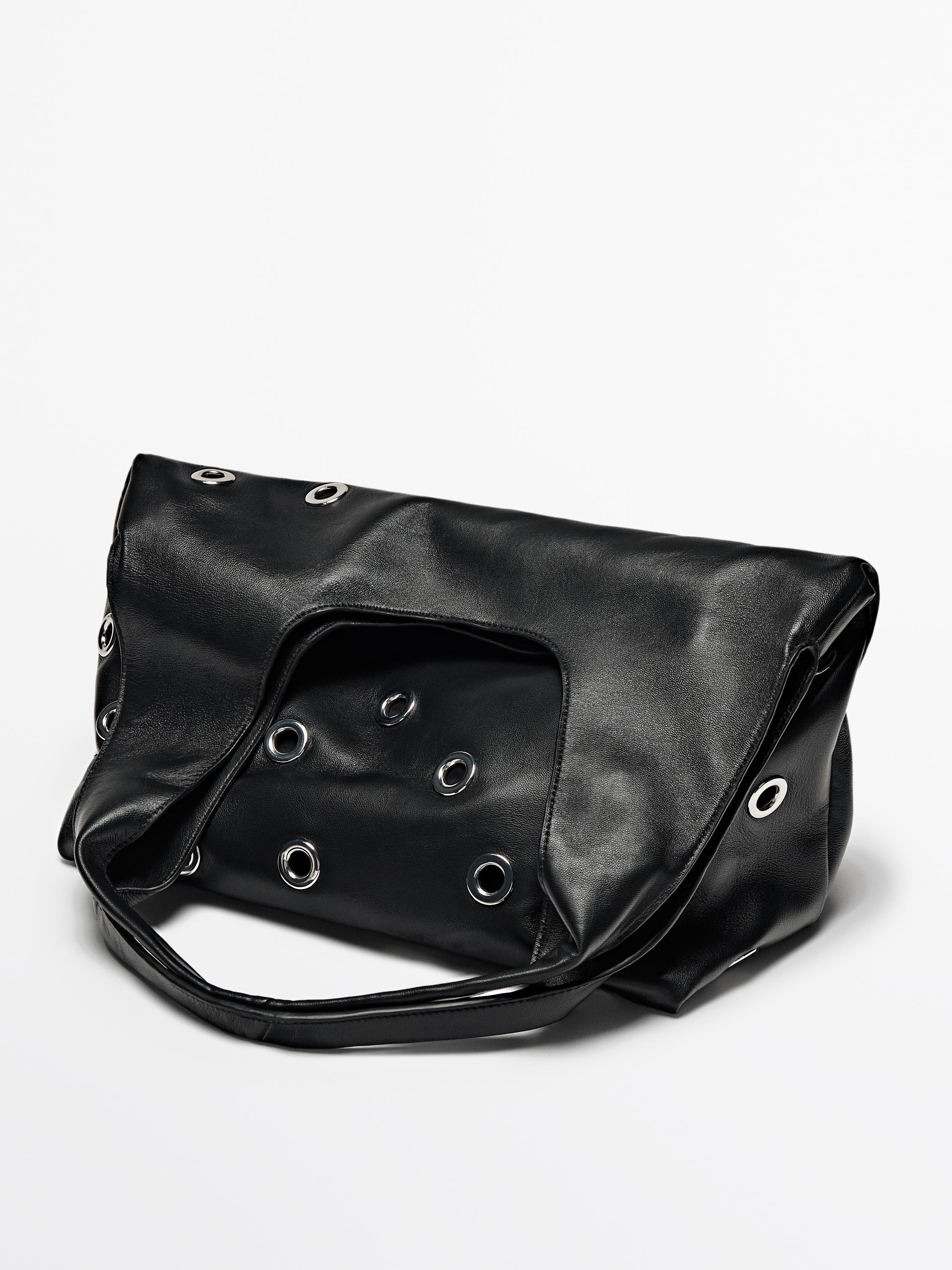 Nappa leather bag with eyelets