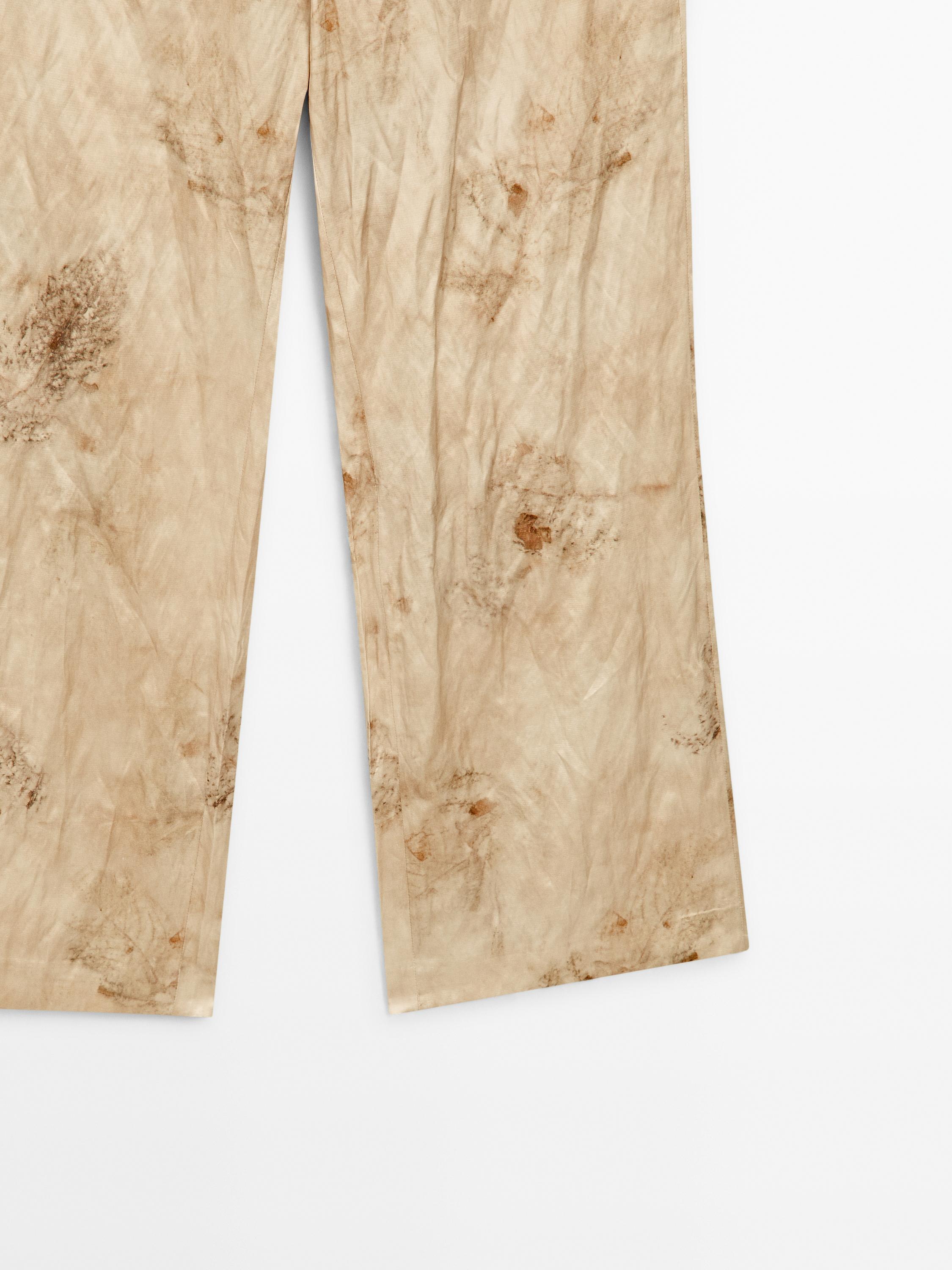 Flowing straight-leg metallic trousers