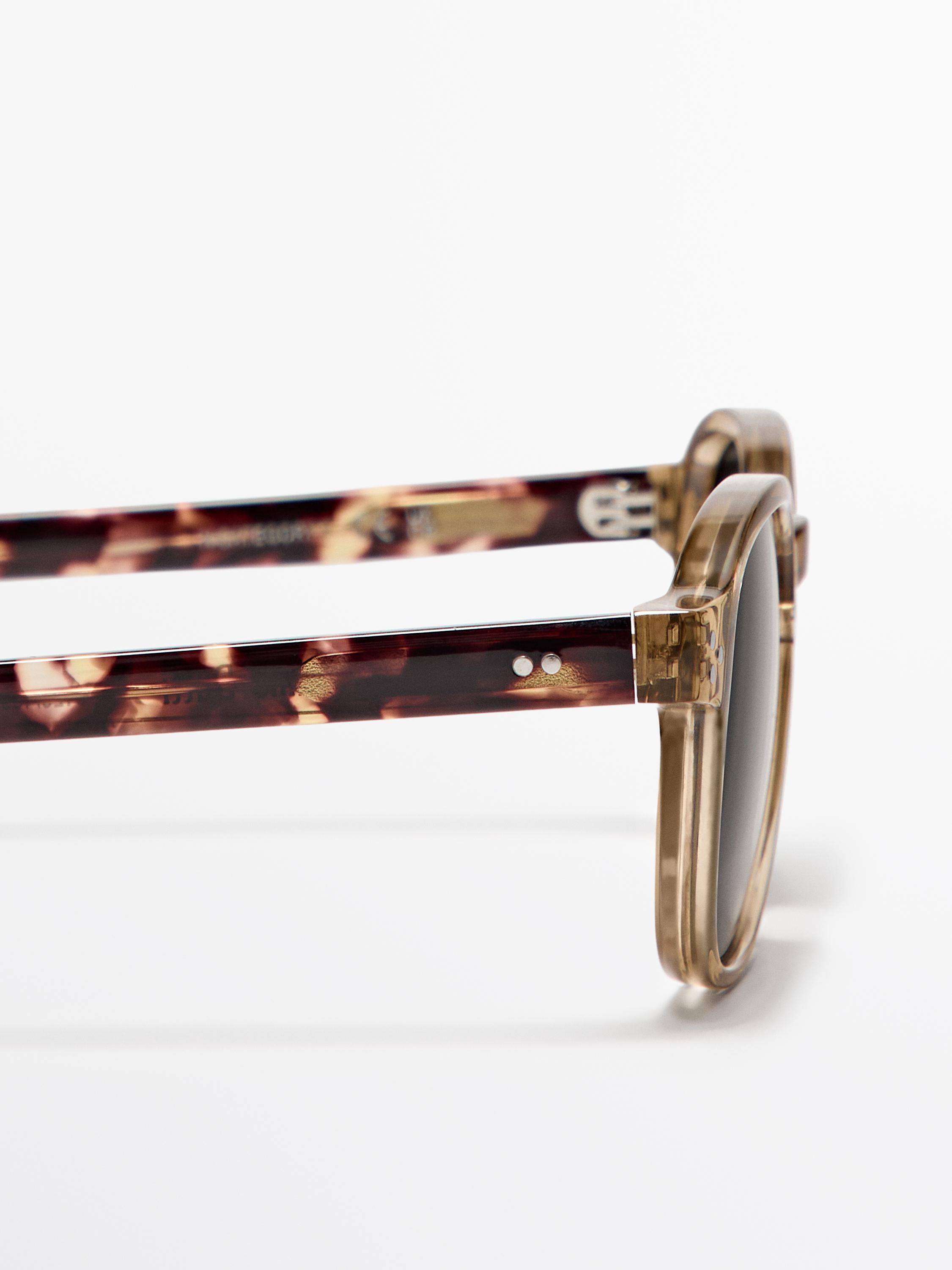 Round tortoiseshell-effect sunglasses
