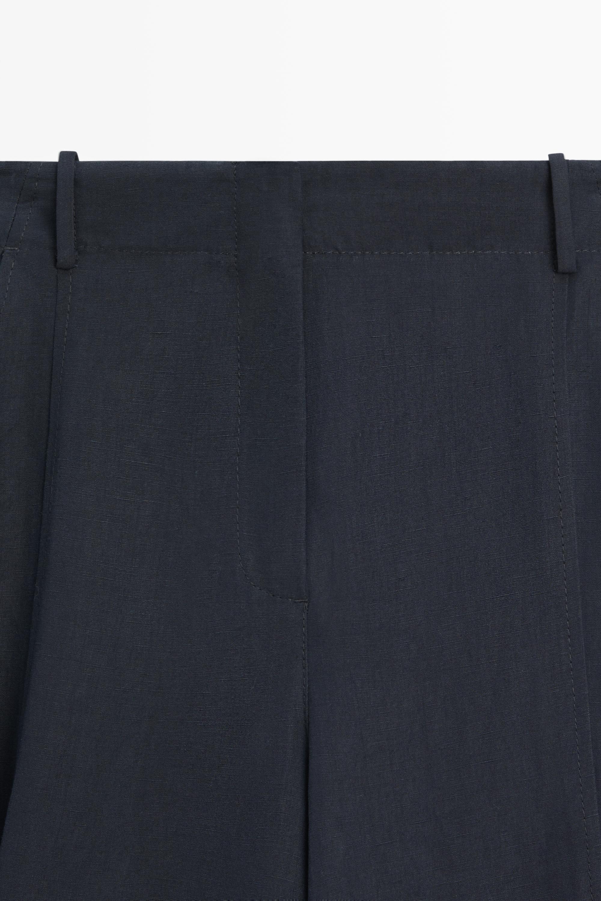 Flowing linen blend pants with buttoned tab detail — NAVY BLUE