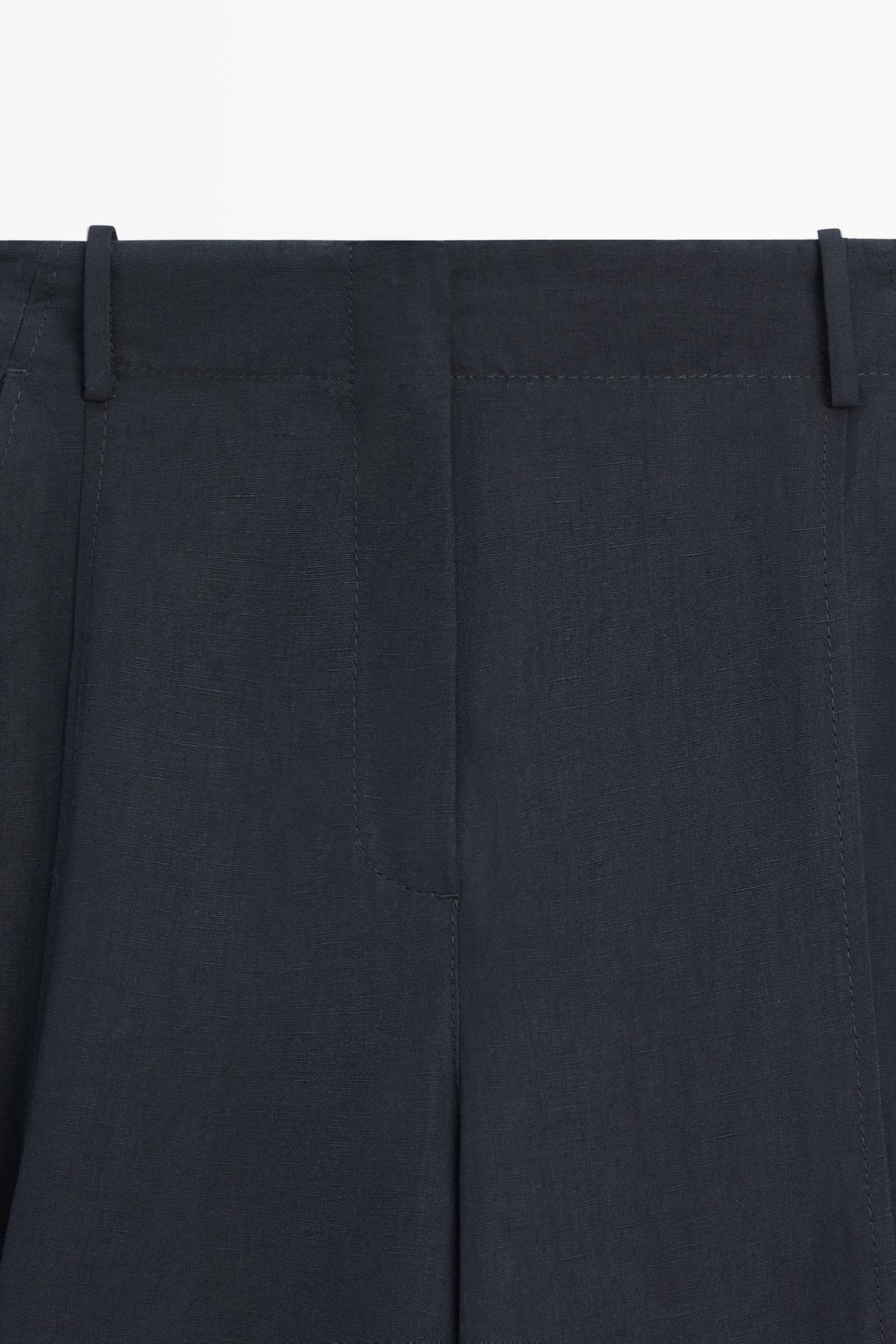 Flowing linen blend pants with buttoned tab detail — NAVY BLUE