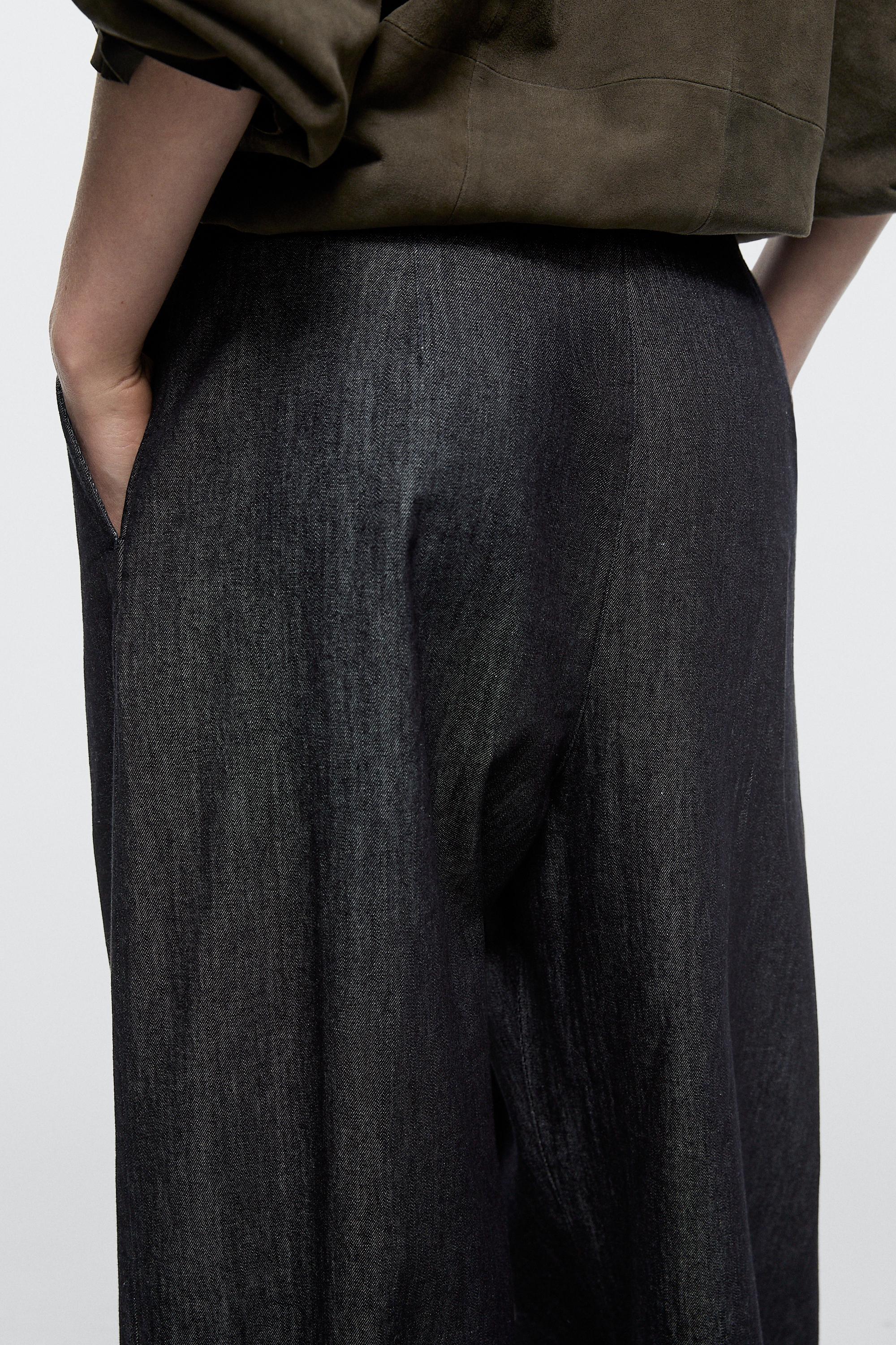 High-waist pants with crossover detail — DARK BLUE