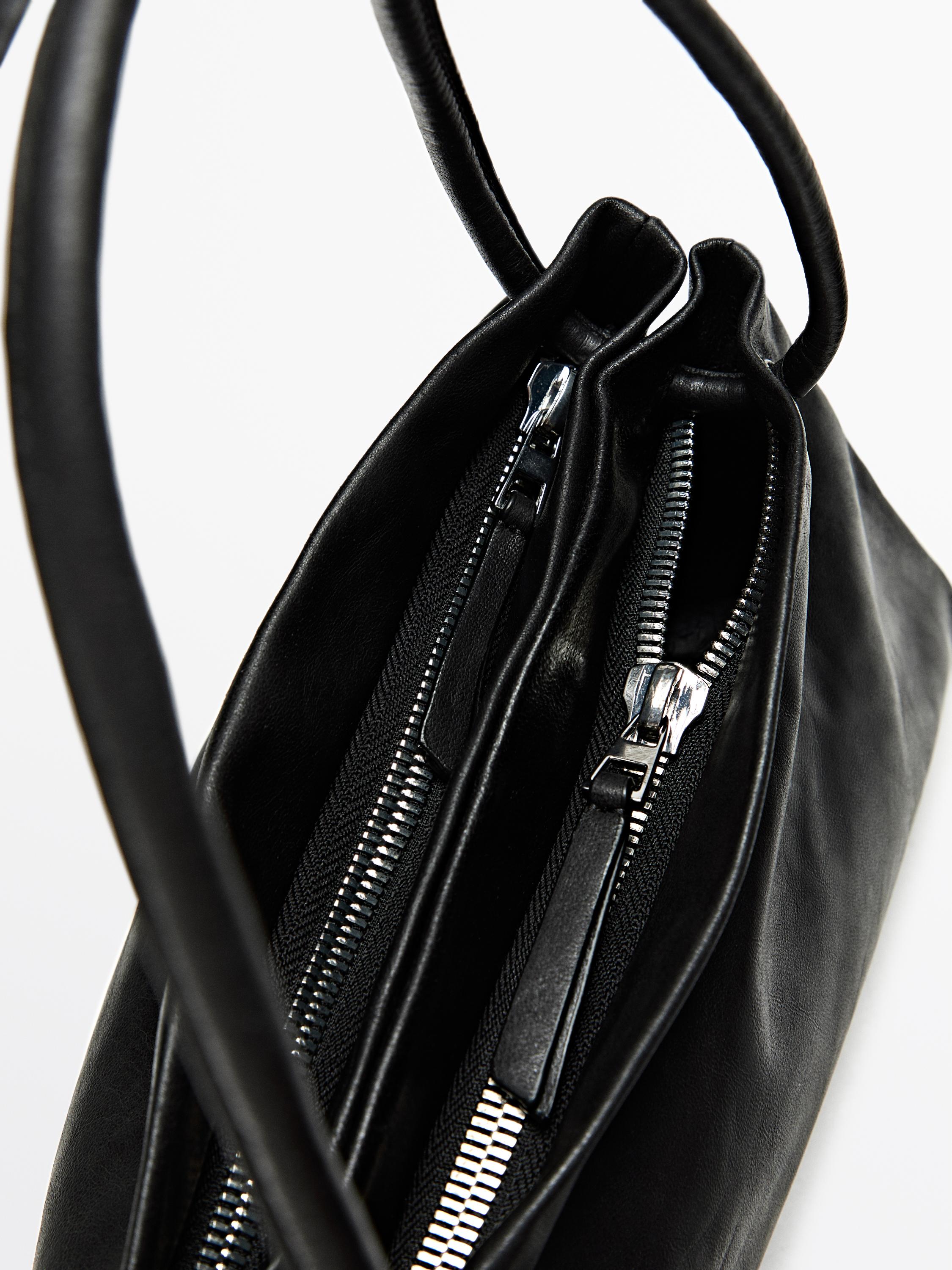 Small nappa leather bag with compartments