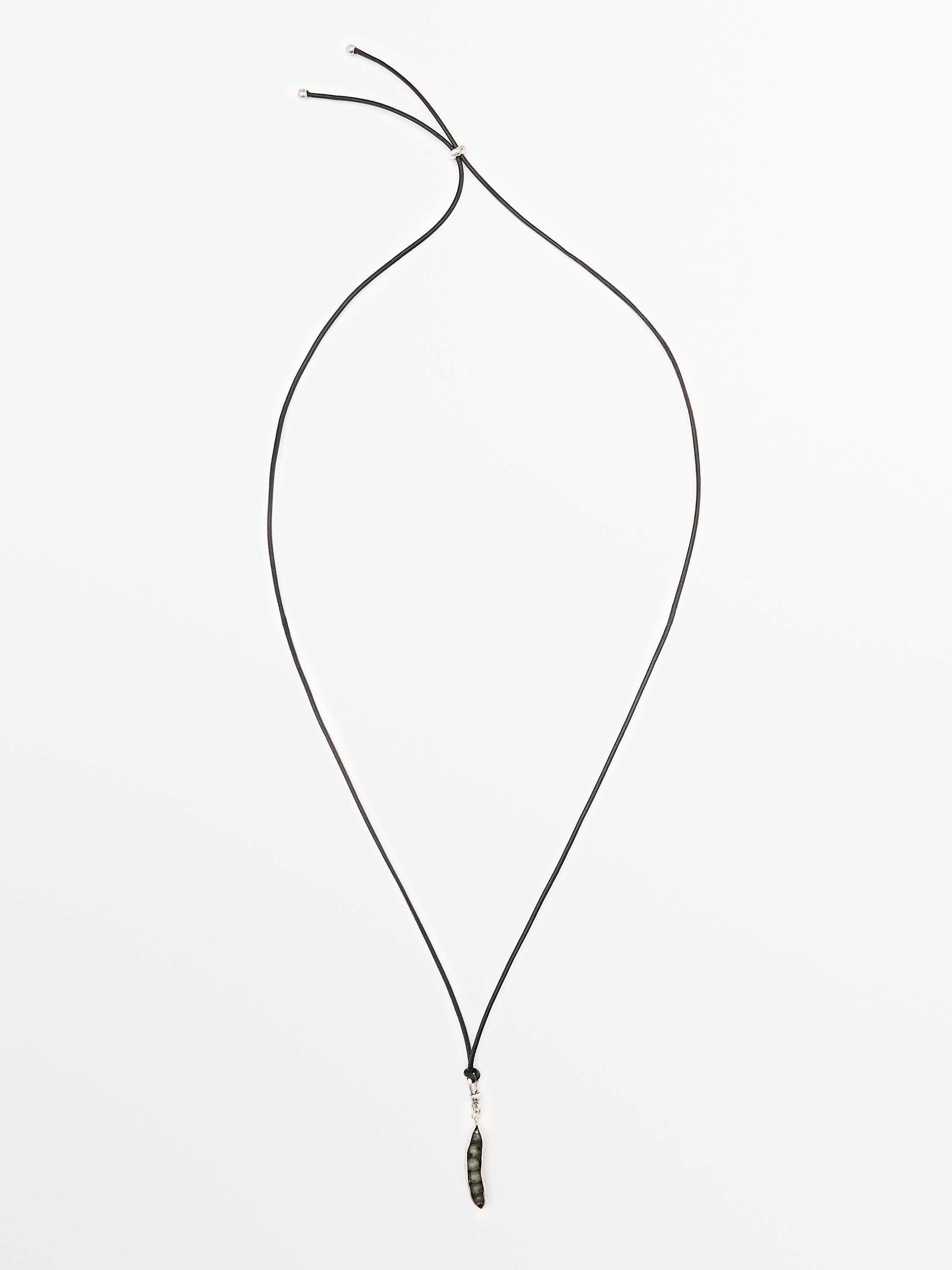 Pendentif en cuir cosse