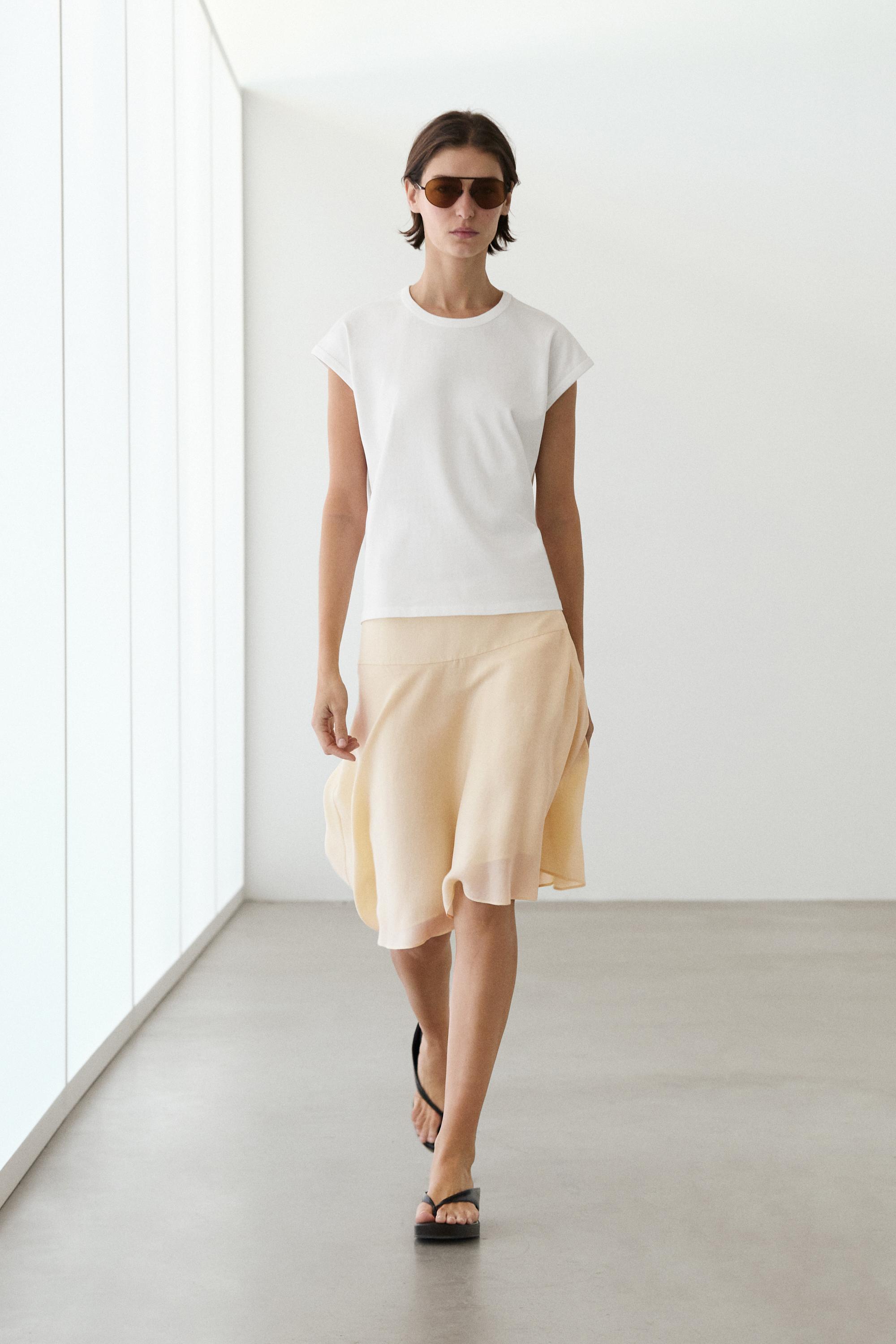 Flowing asymmetric midi skirt — Gold