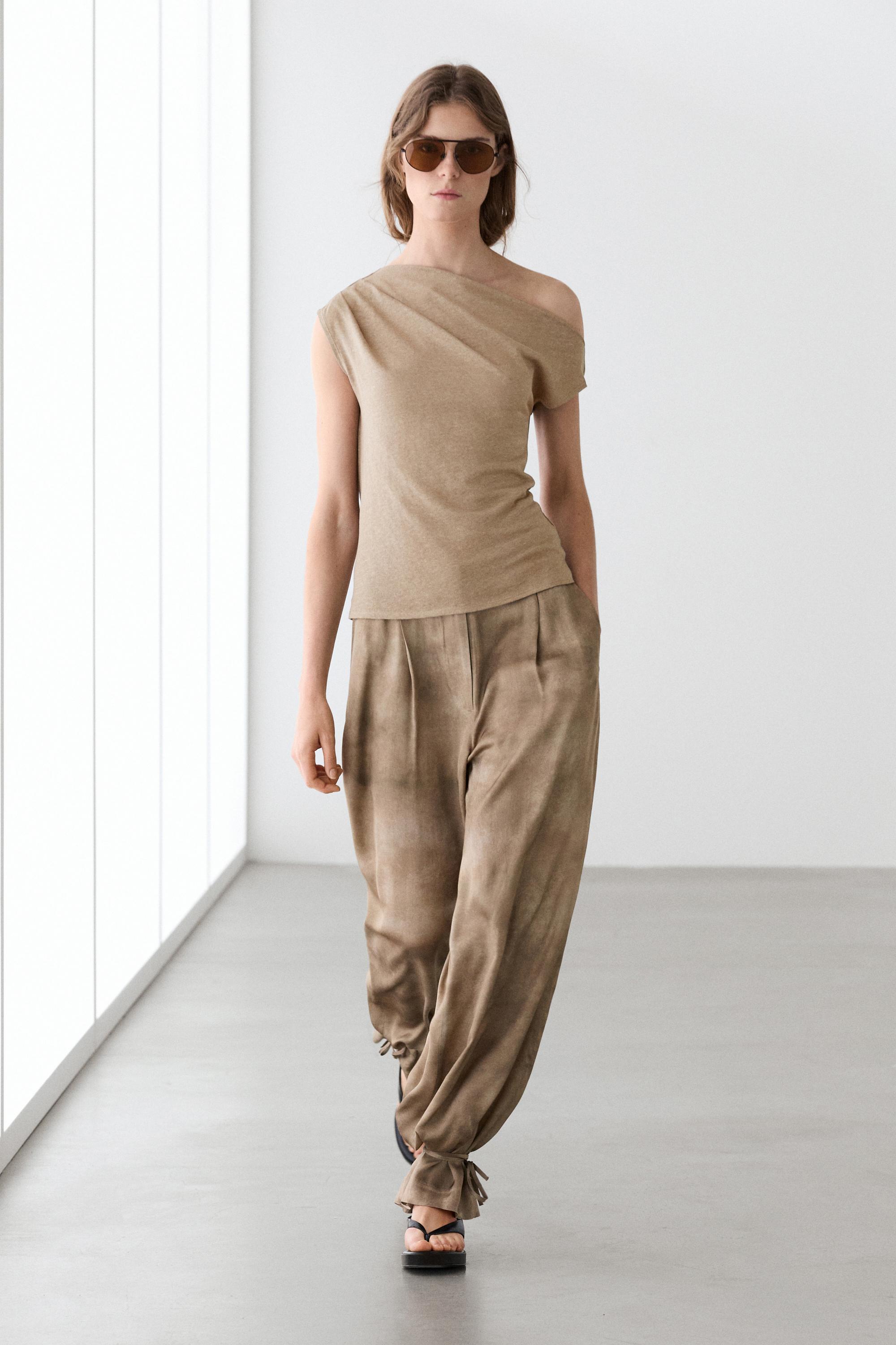 Asymmetric linen blend top with draped detail — Washed