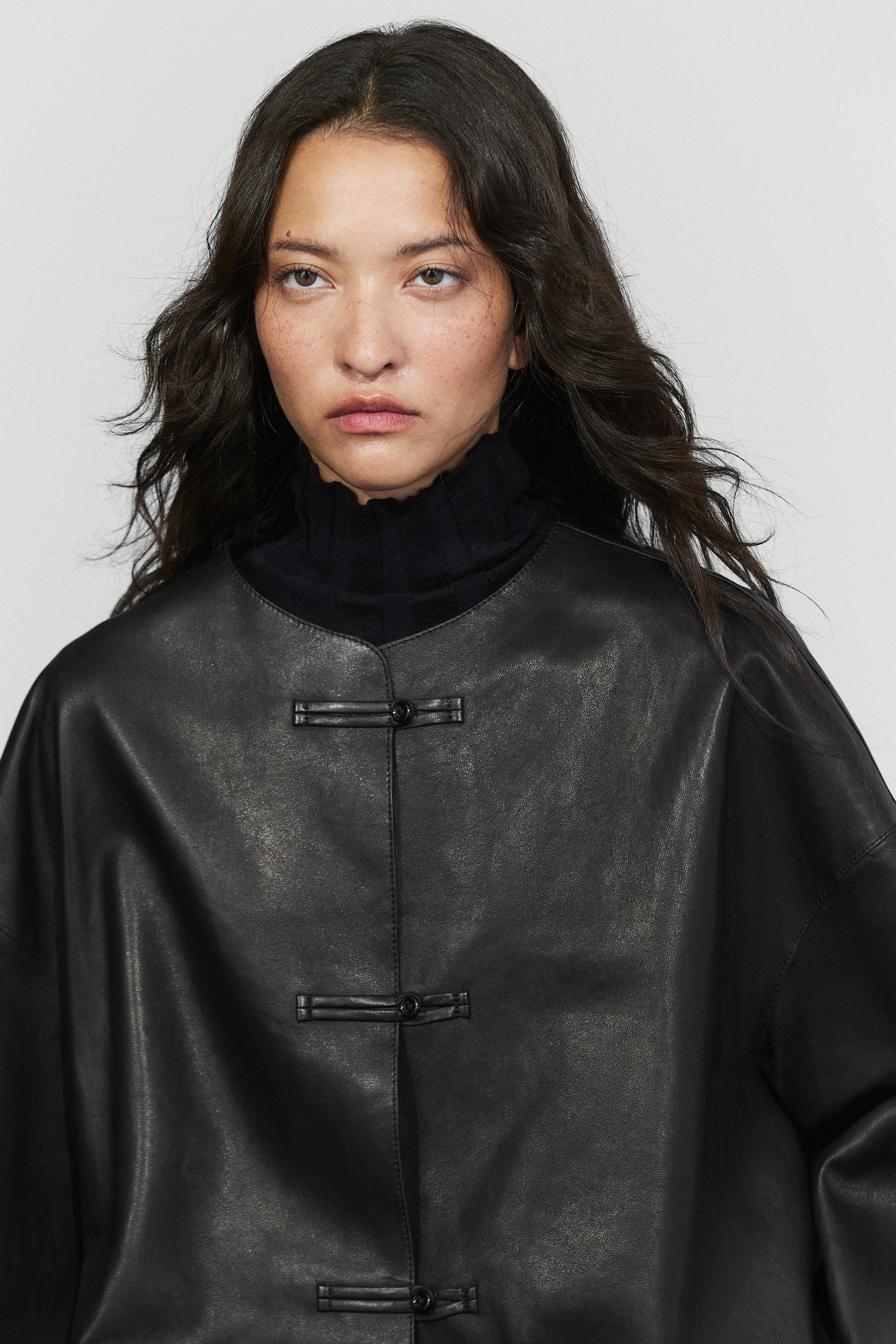 Leather jacket with toggle detail
