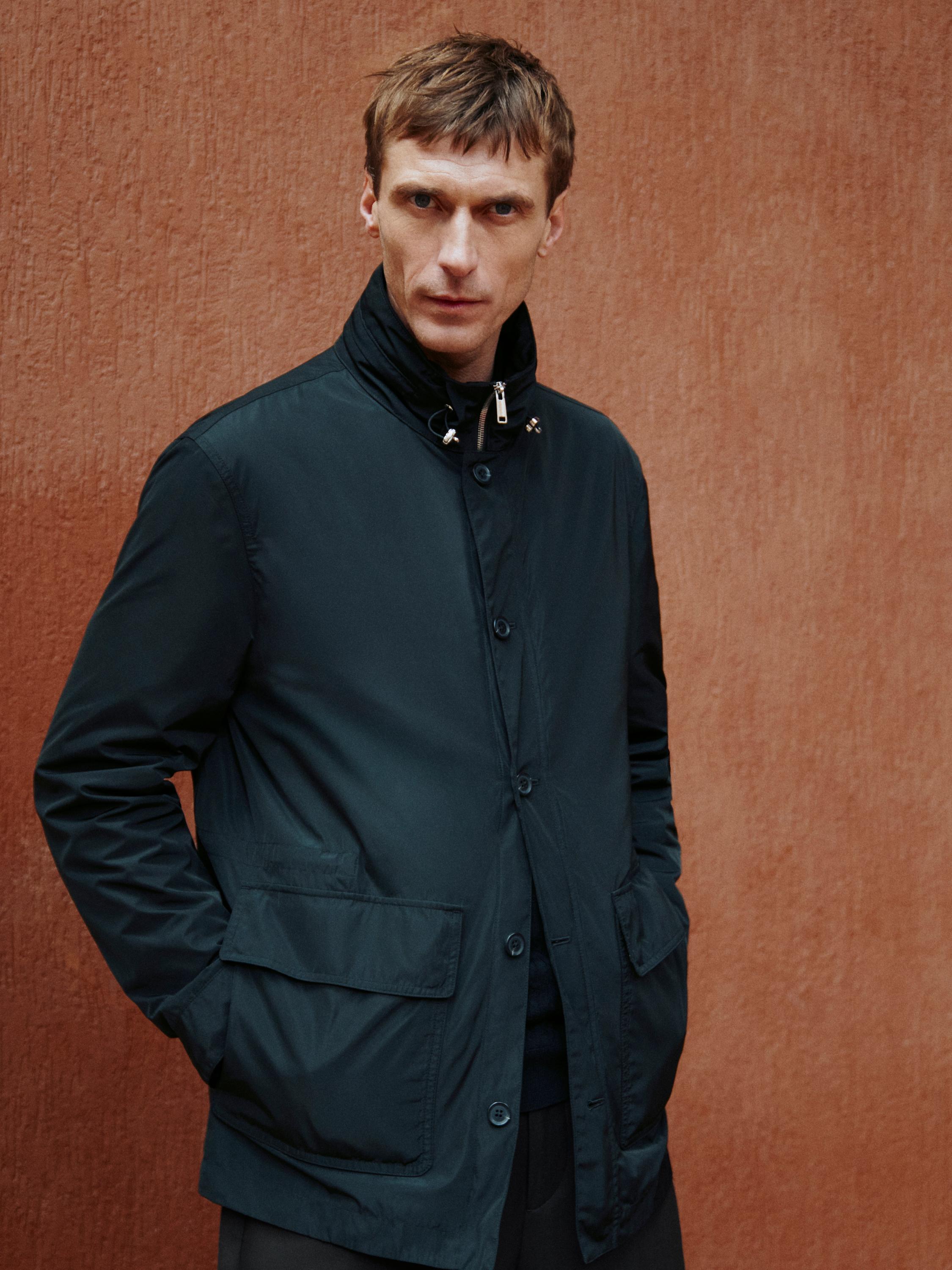 Hooded parka with fabric detail