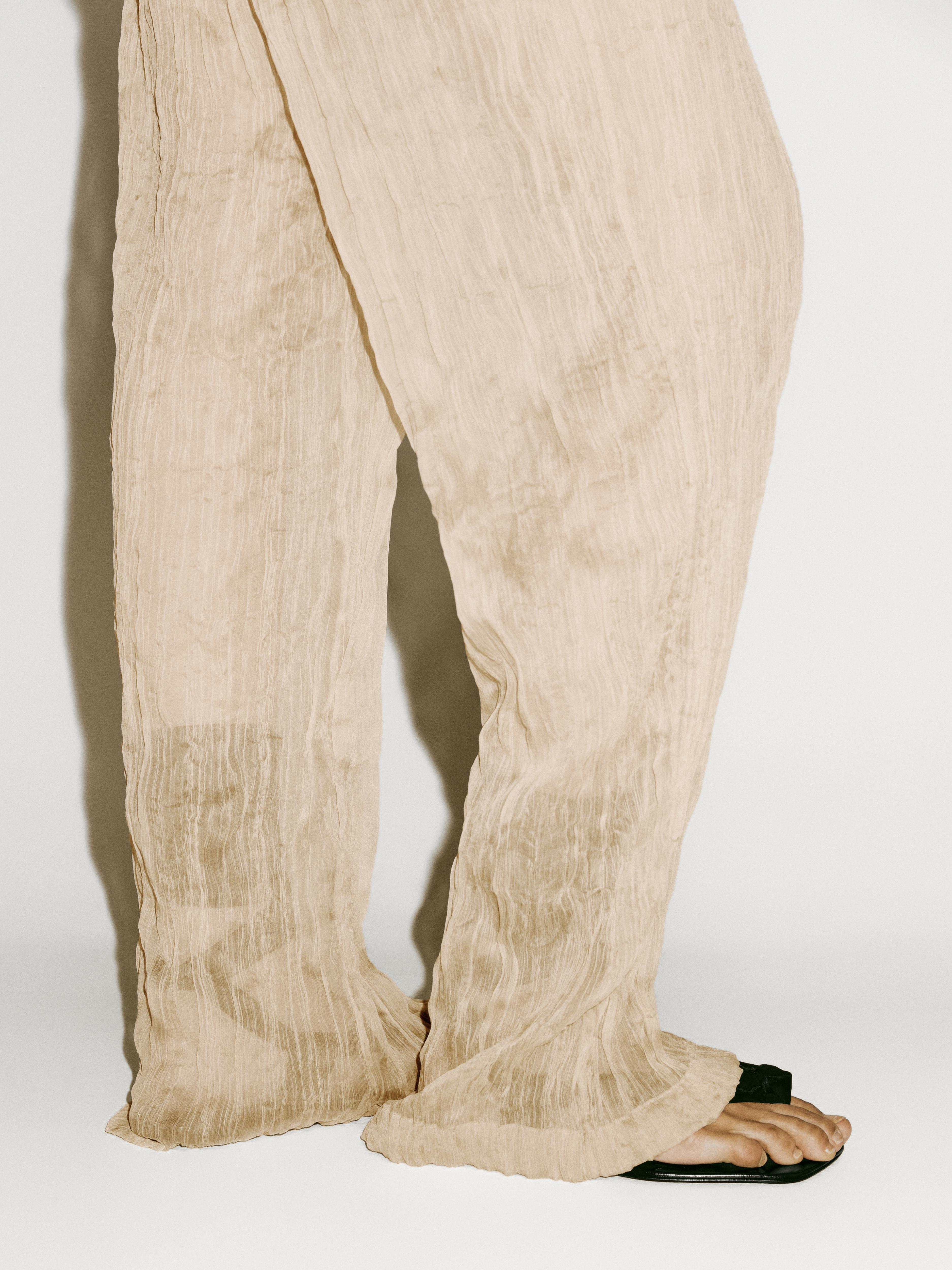 Flowing pleated trousers - Limited Edition