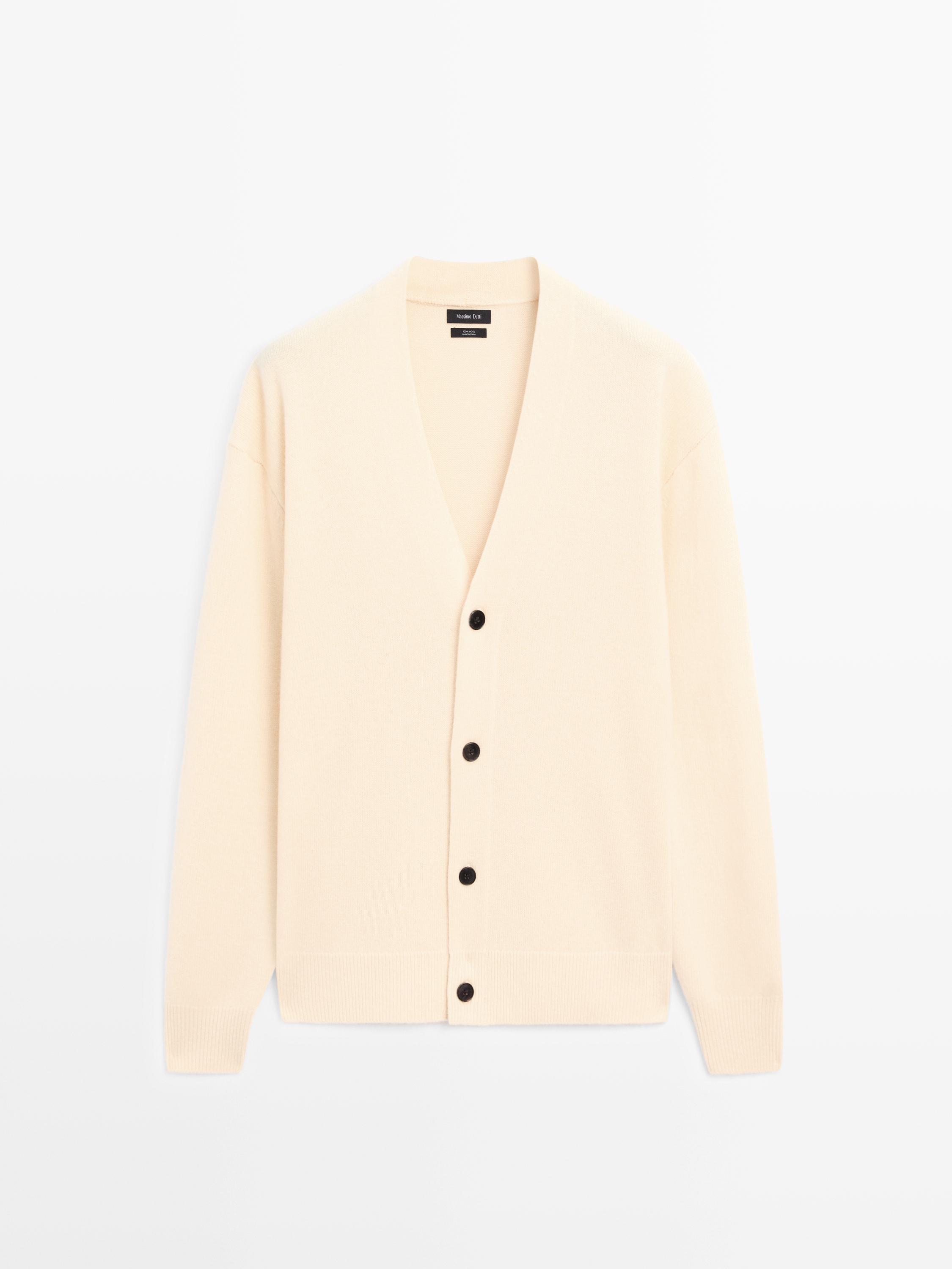 Pletena jopa z v-izrezom iz 100 % volne