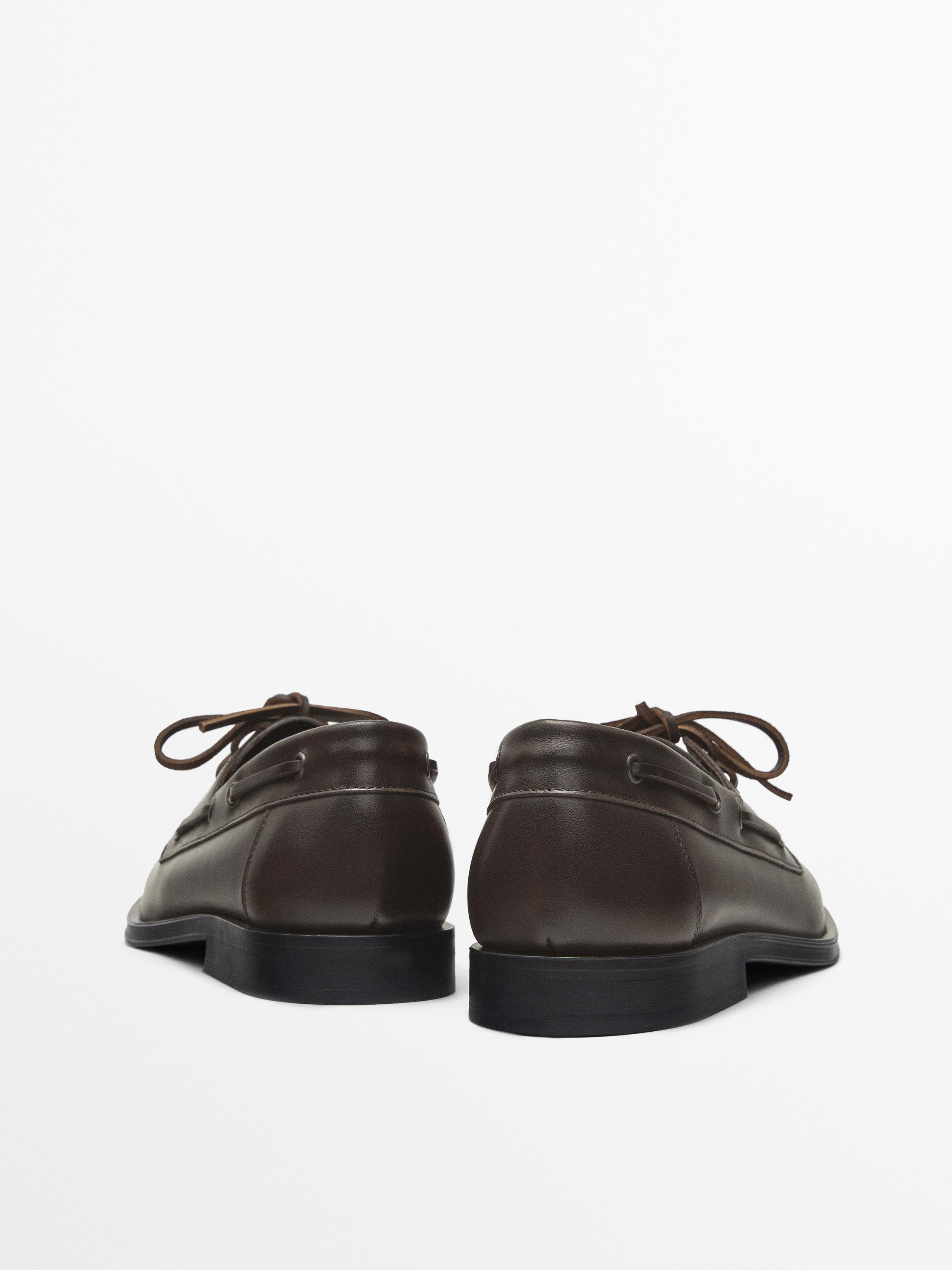 Brown leather deck shoes