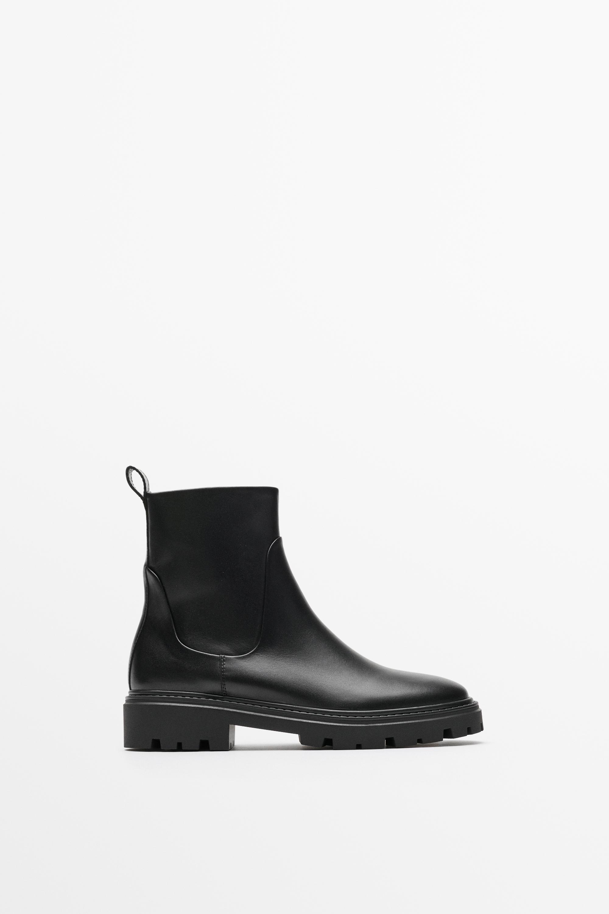 Flat leather ankle boot with track sole
