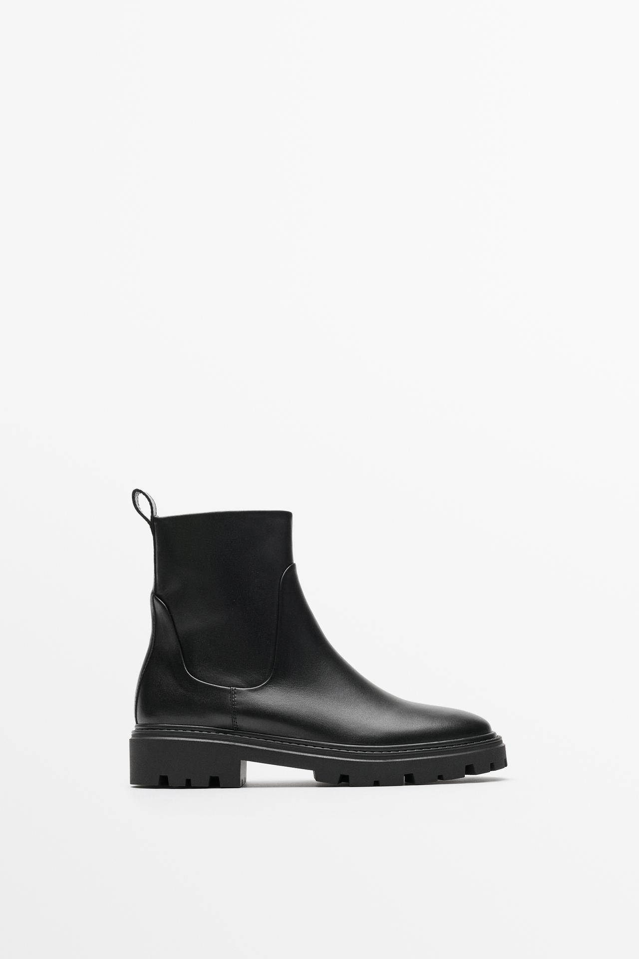 Flat leather ankle boot with track sole — BLACK