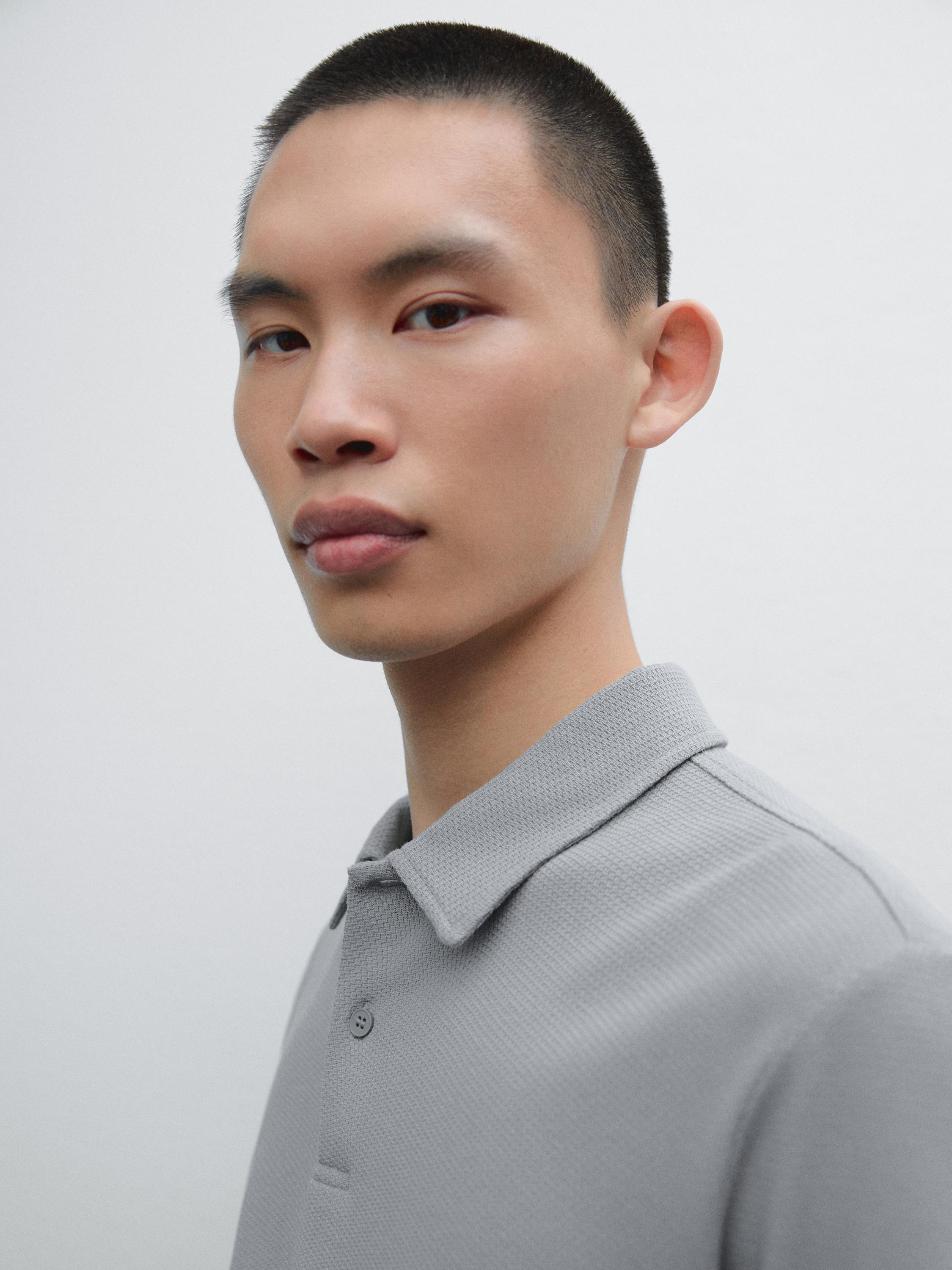 Polo en maille texturée de coton