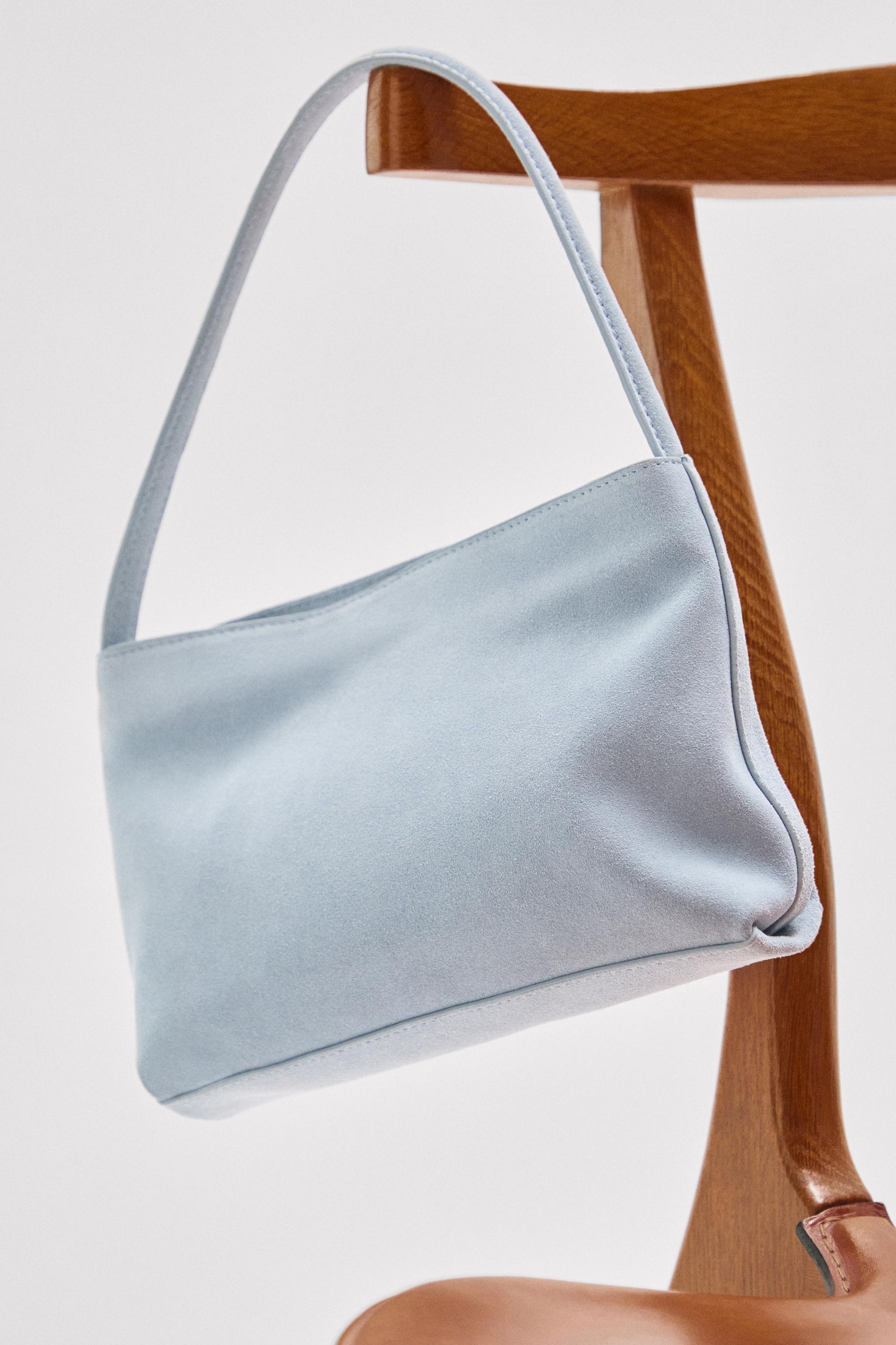 Split suede leather shoulder bag — Light blue