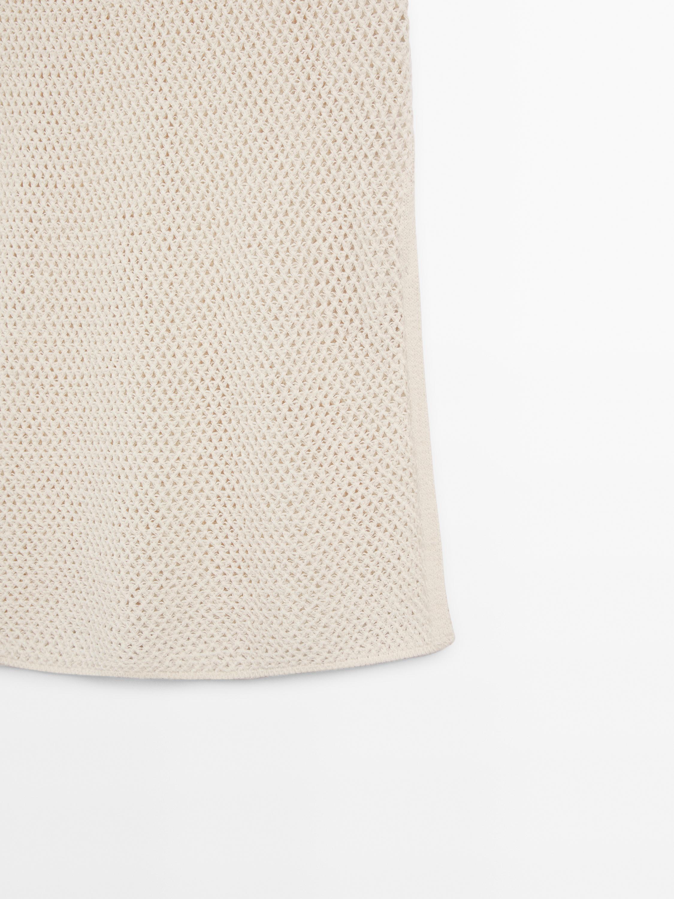 Knit vest with vent details