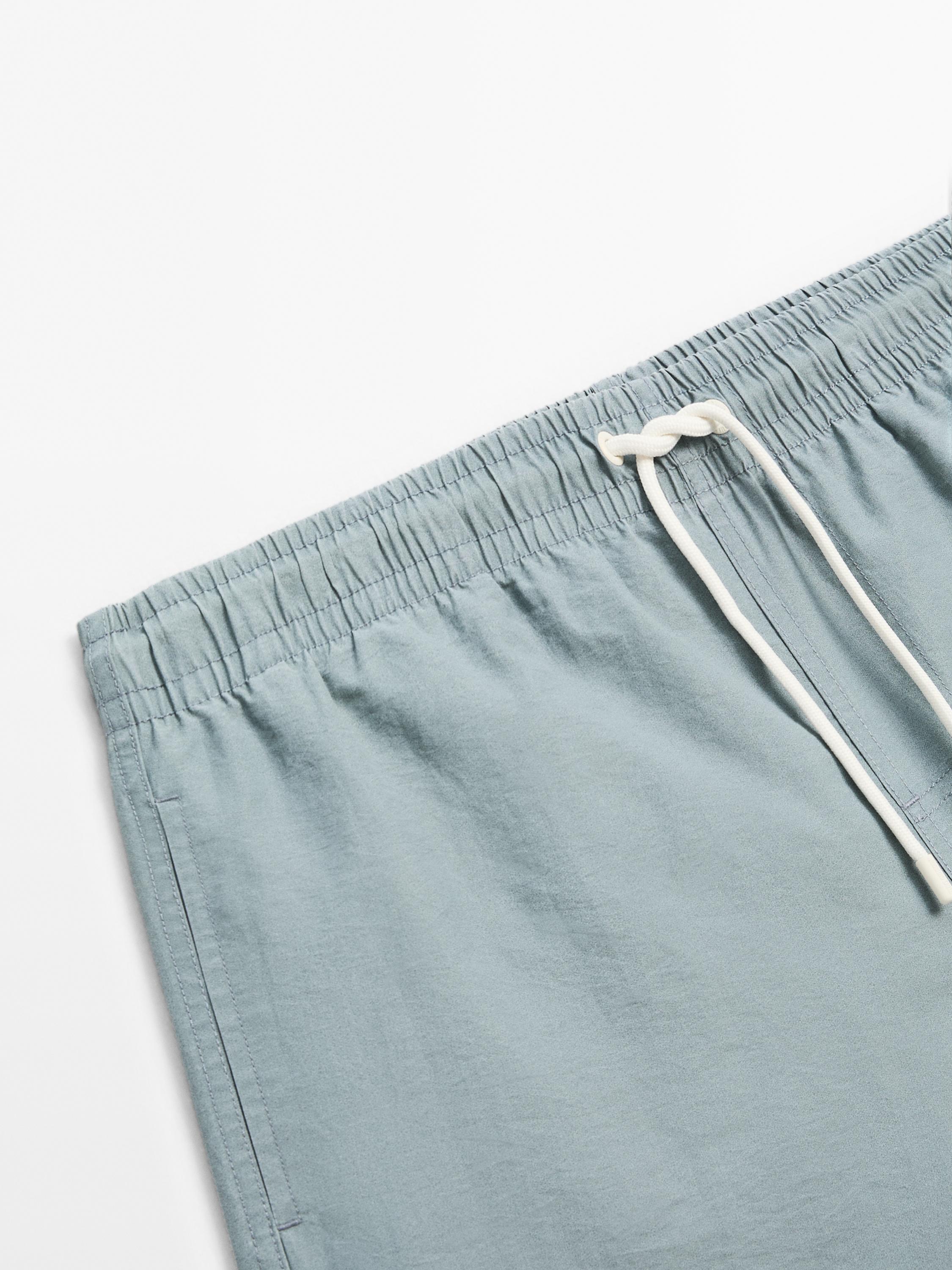 Plain regular fit swimming trunks