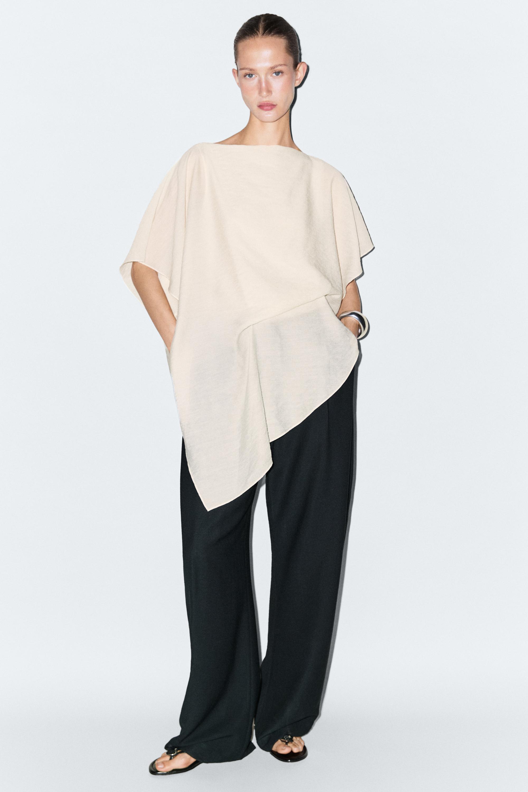 Asymmetric cape-style flowing blouse — Off white