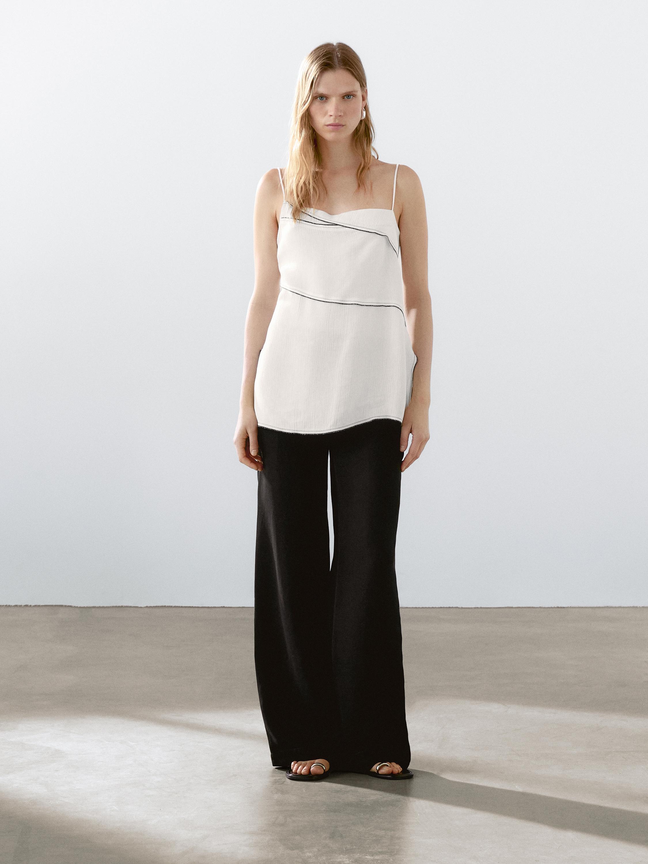 Flowing top with topstitching detail