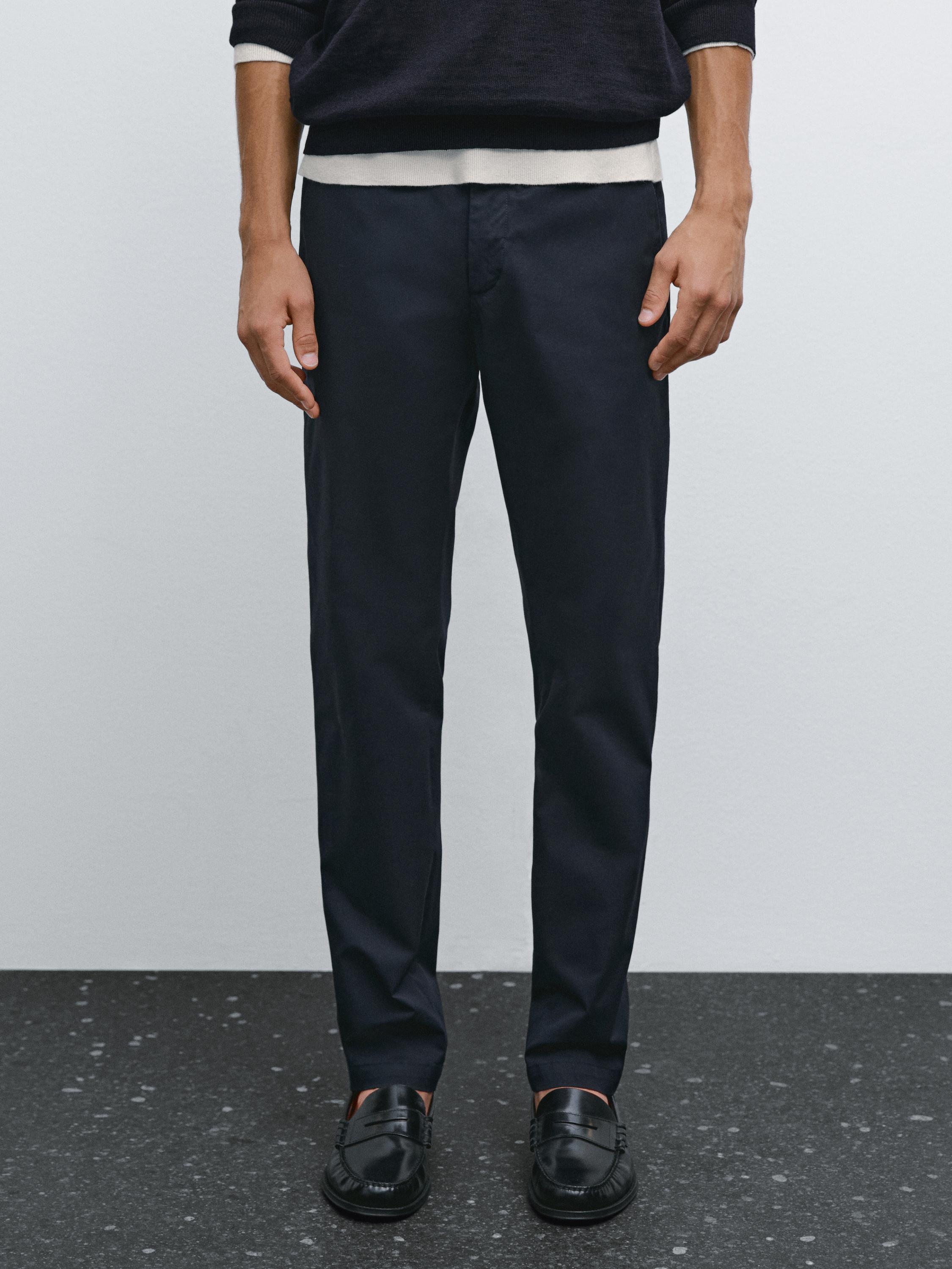 Slim fit панталони од мешавина со памук