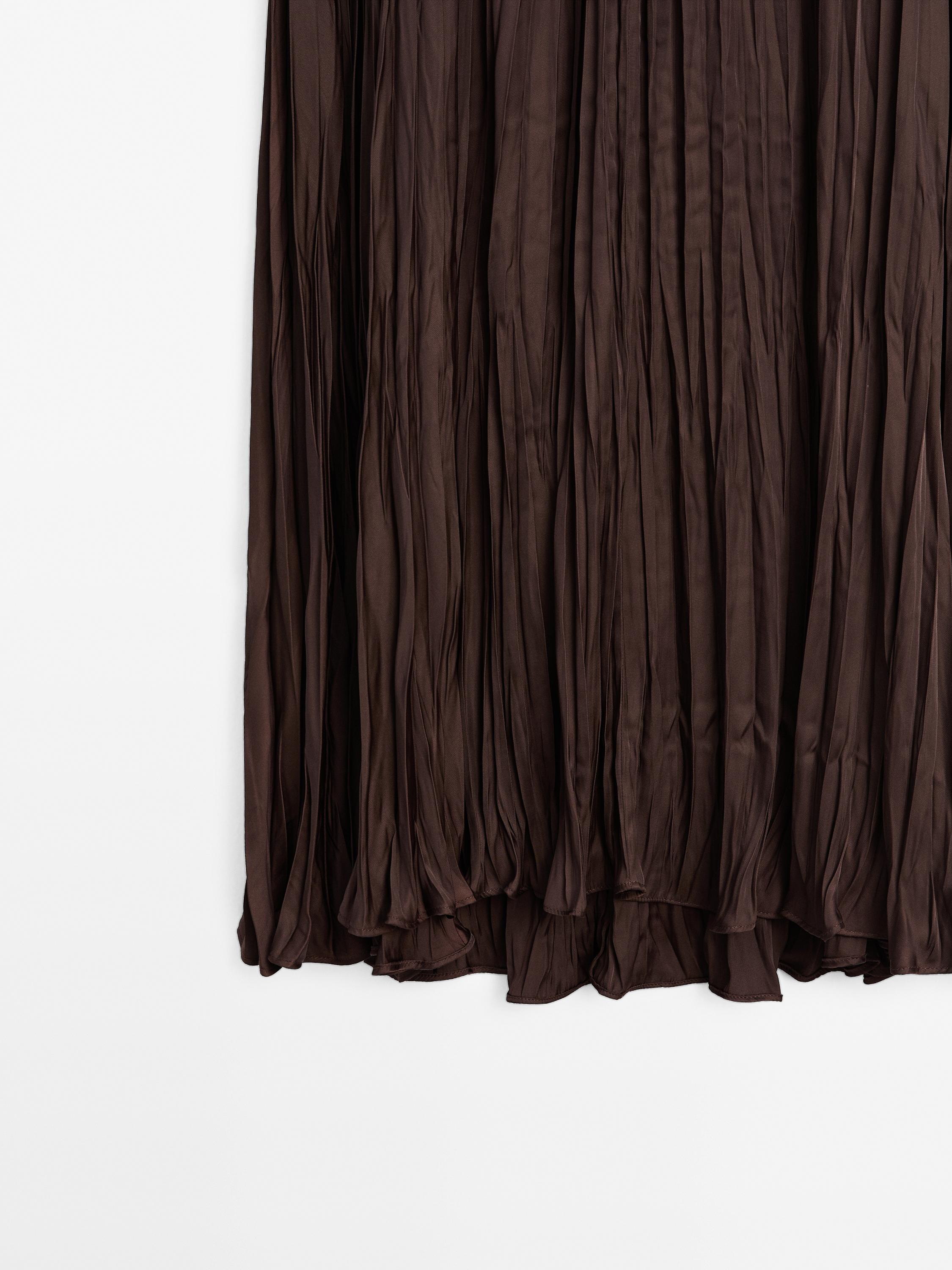 Long flowing pleated skirt