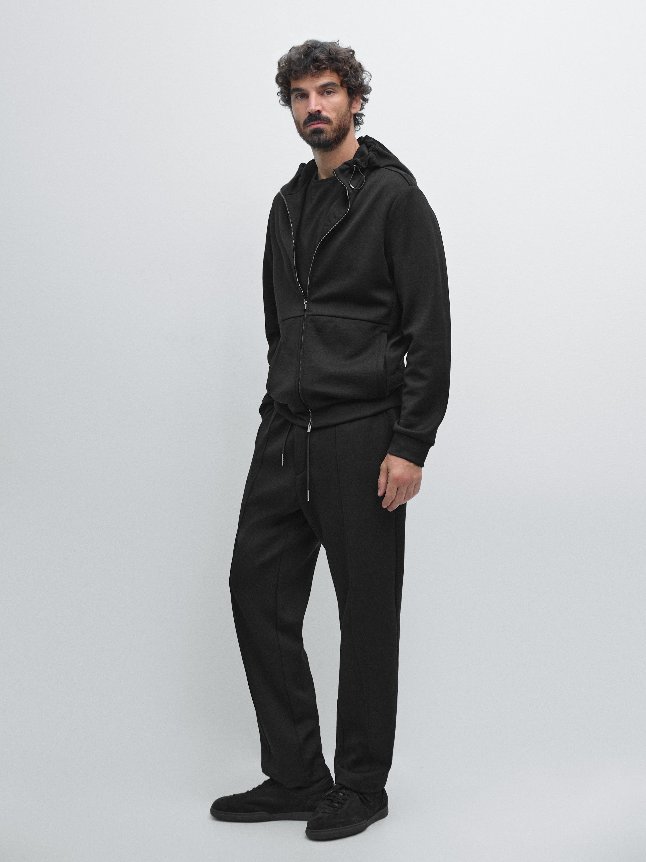 Jogger jacket with adjustable hood