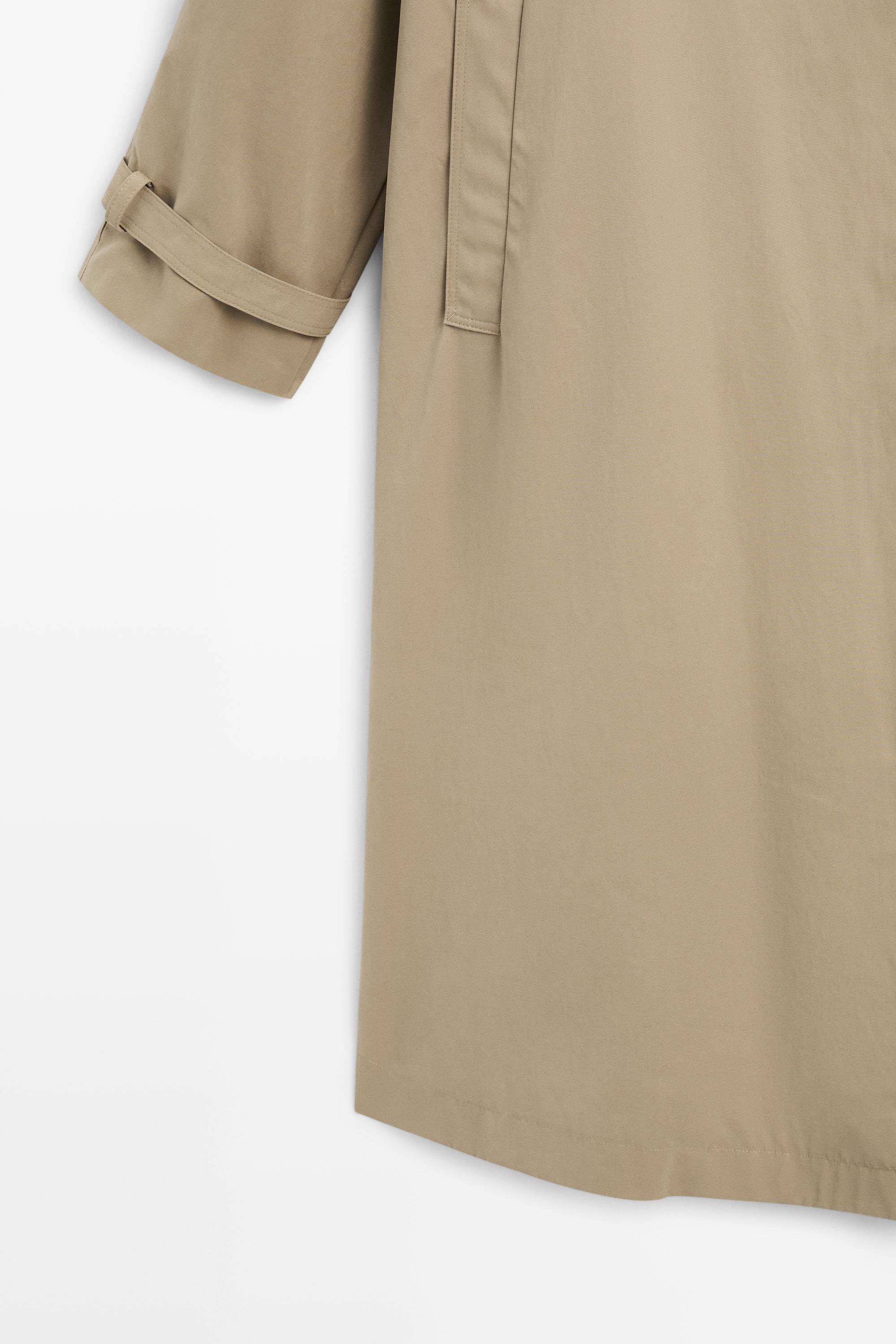 Long trench coat with buckle detail — Beige