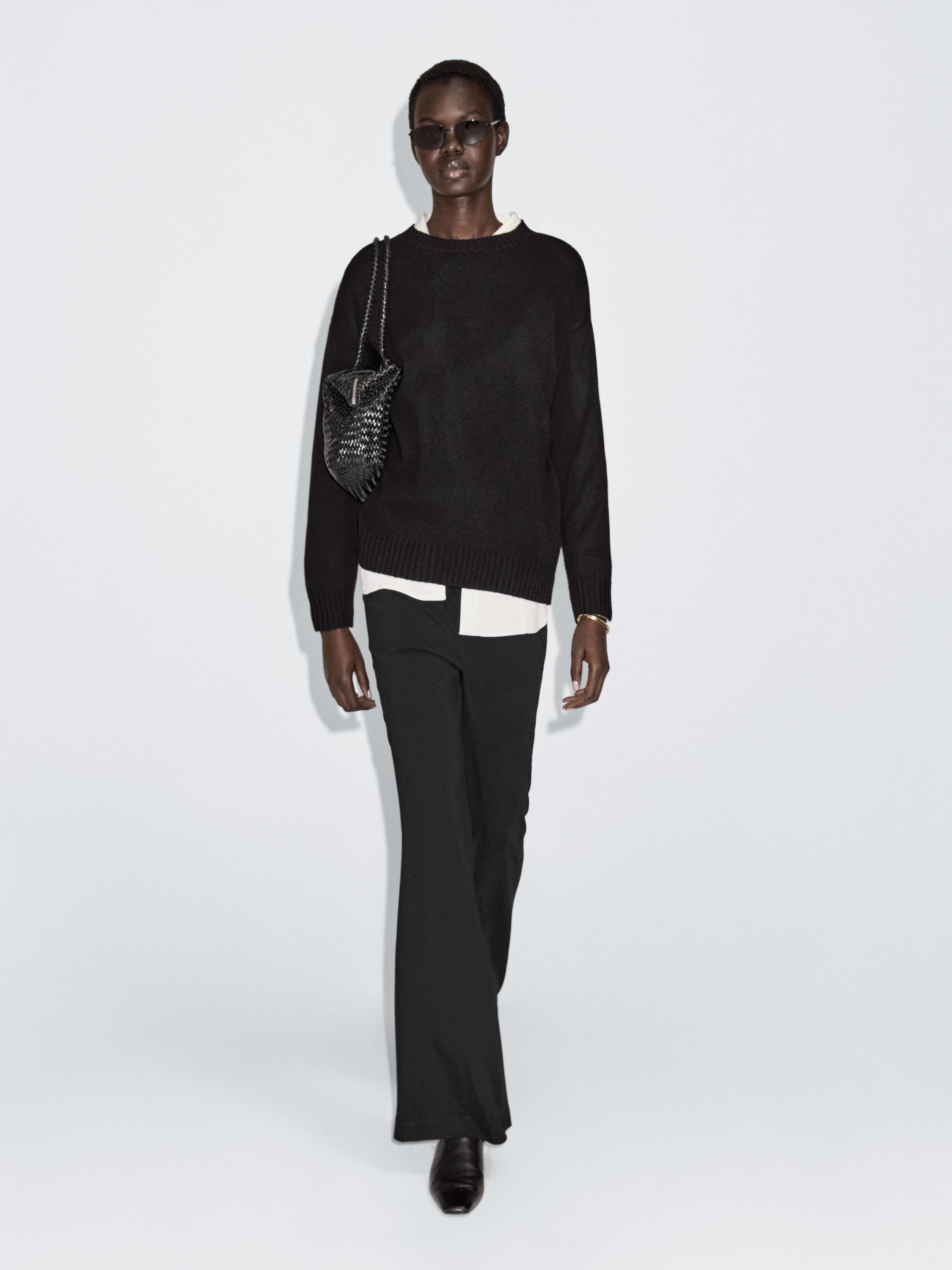 Flared trousers with pocket — BLACK