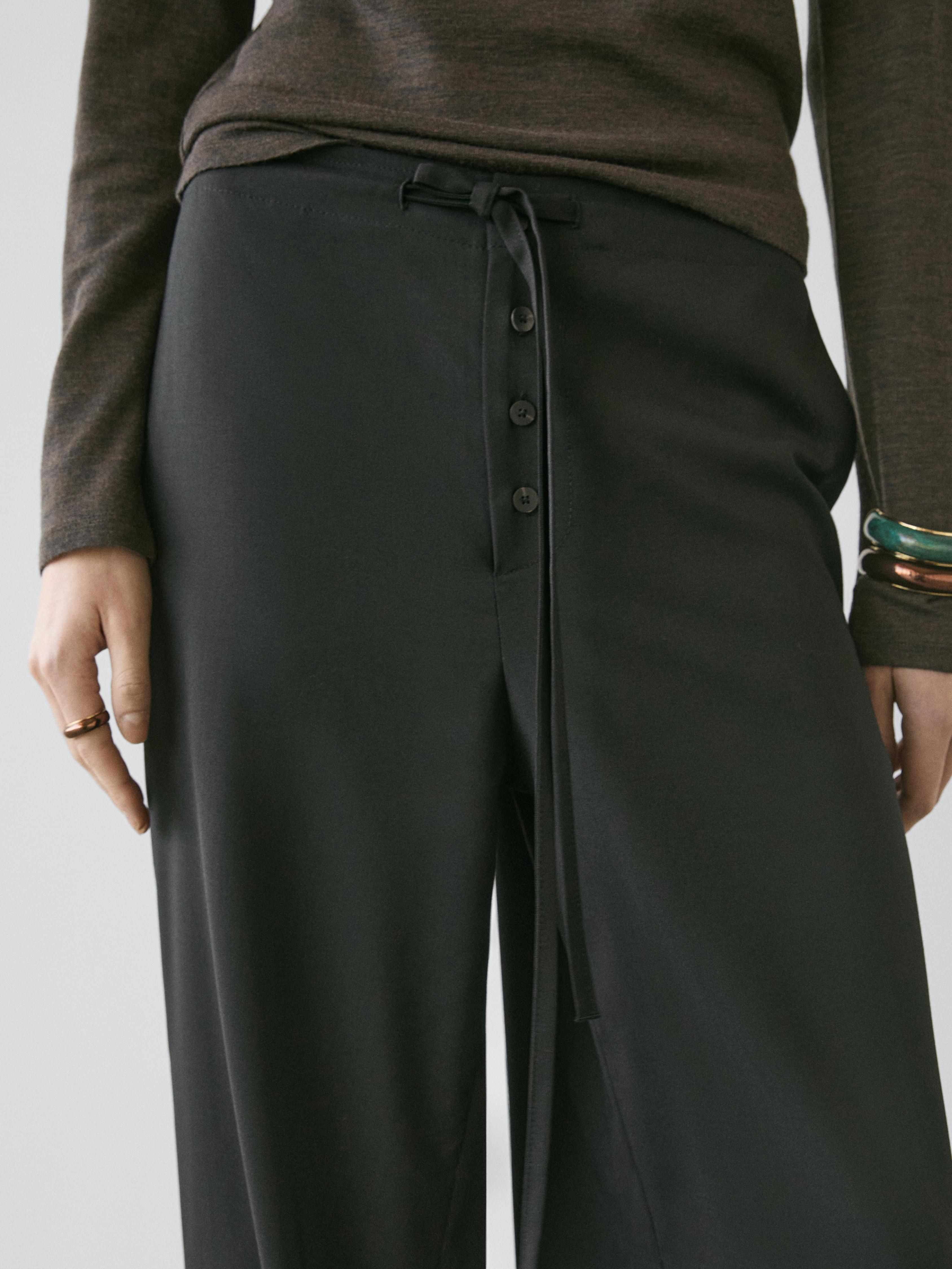 Wool sarouel trousers with tie detail — BLACK