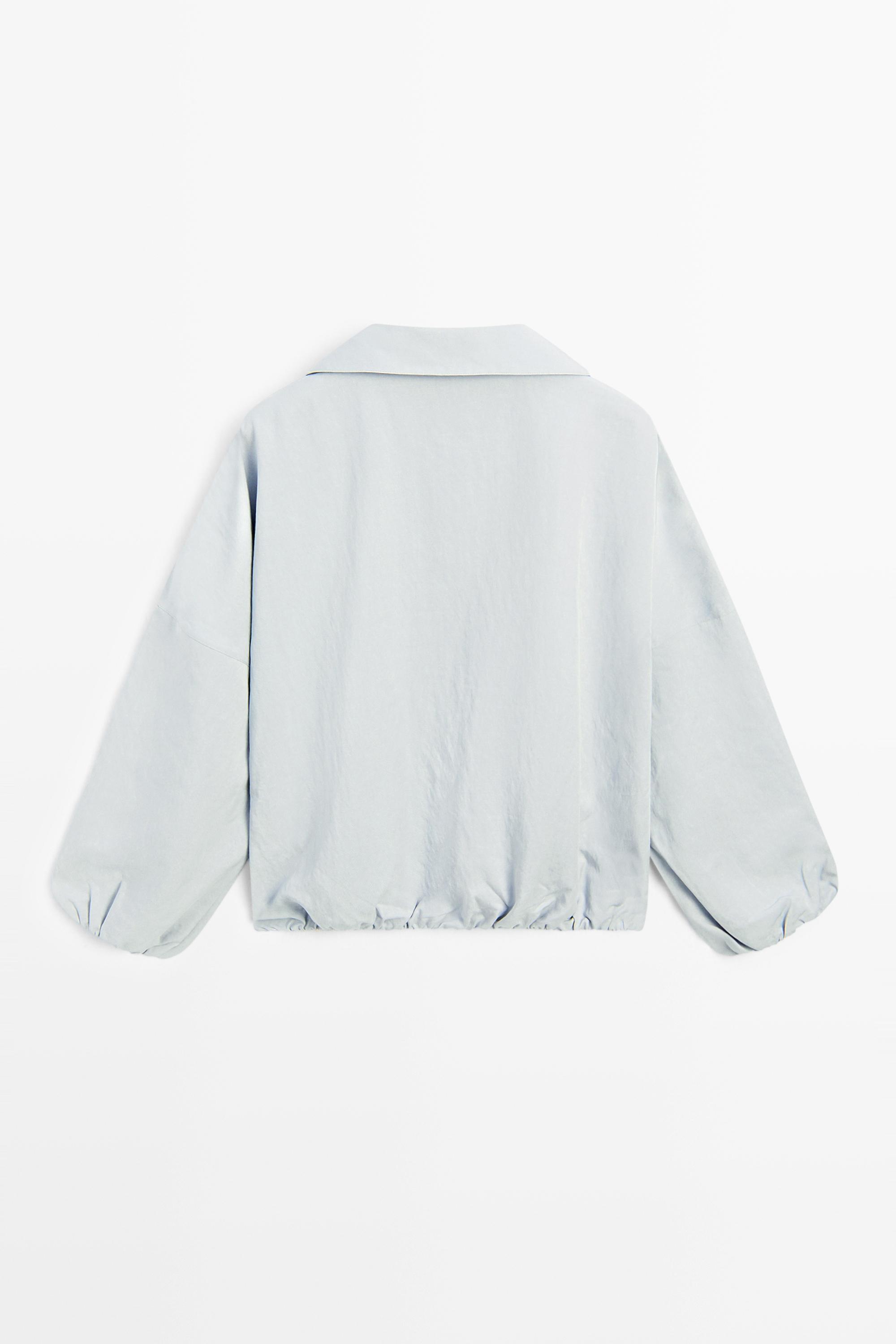 High collar bomber jacket with pocket details — Light blue