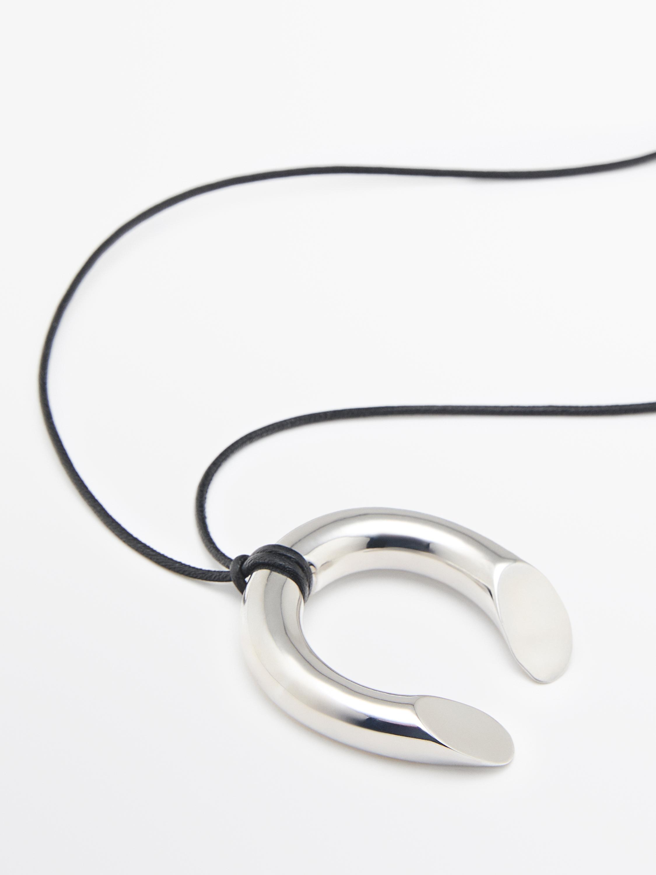 Taqa komponentli kolye