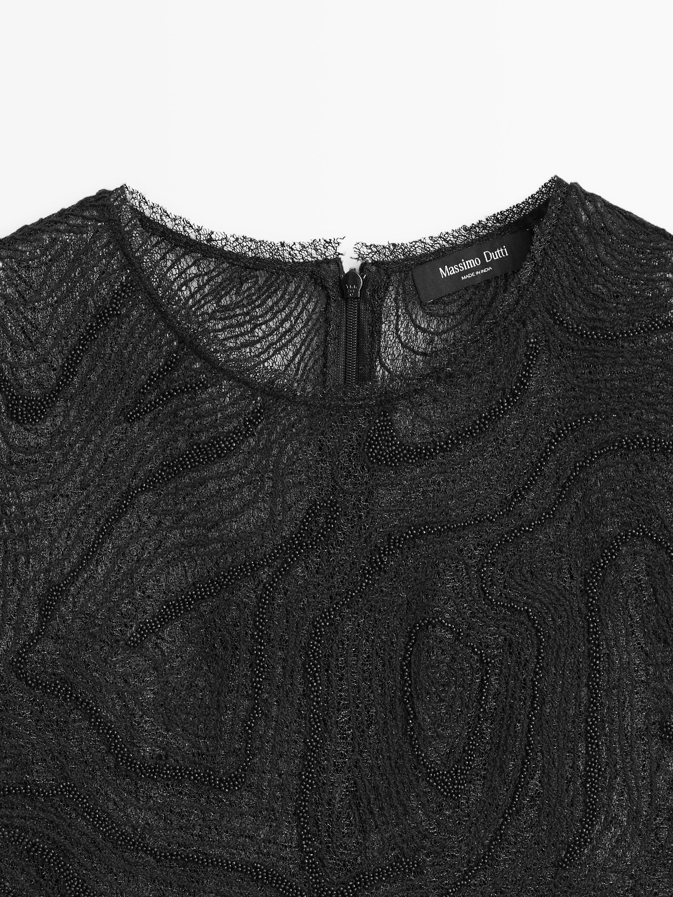 Semi-sheer embroidered top