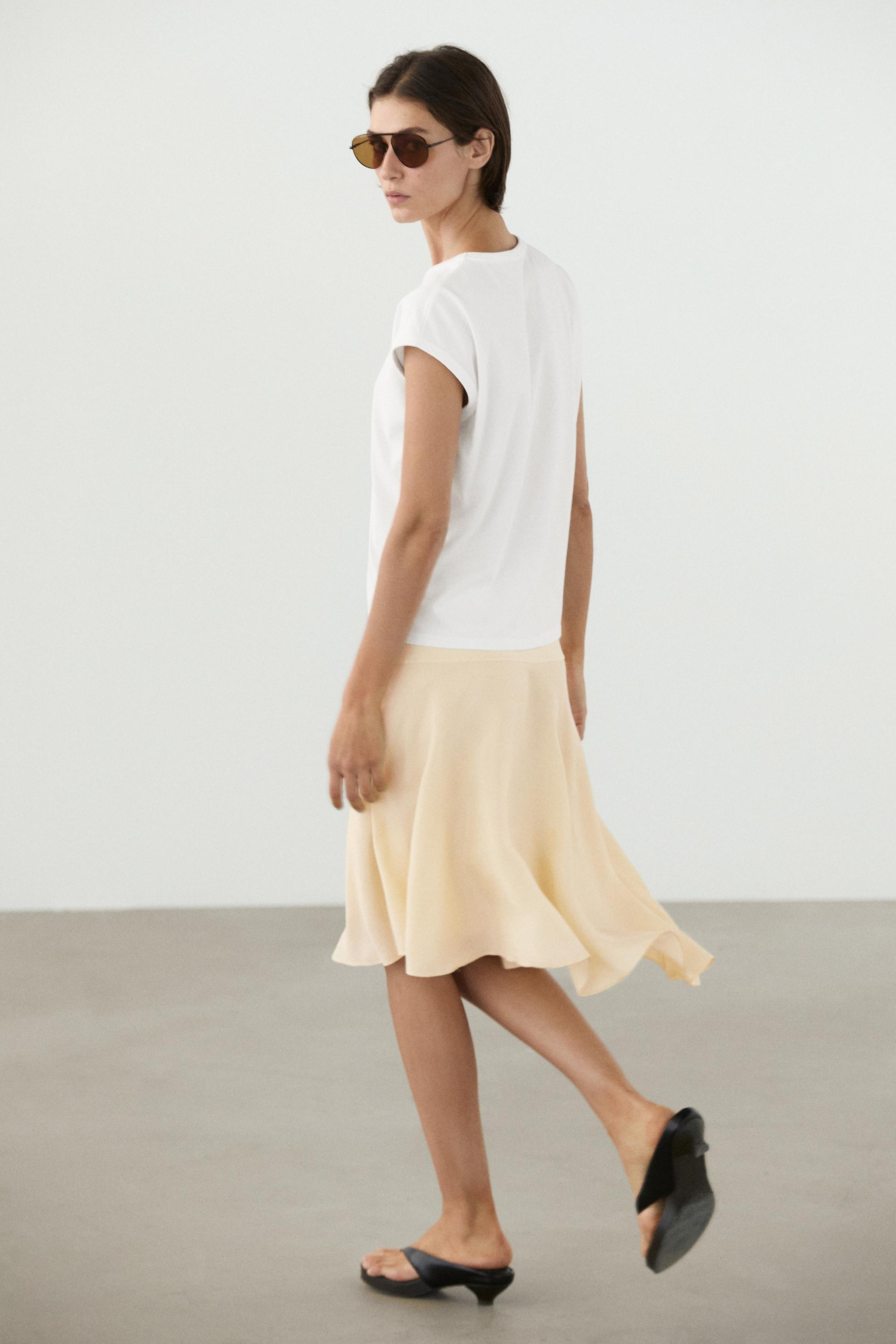 Flowing asymmetric midi skirt — Gold