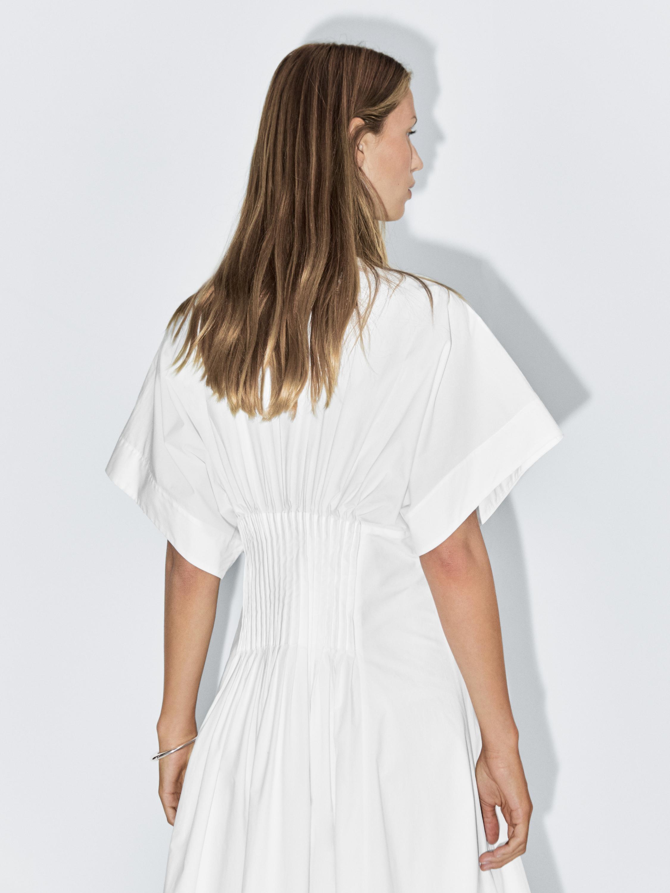 Long dress with pleated detail