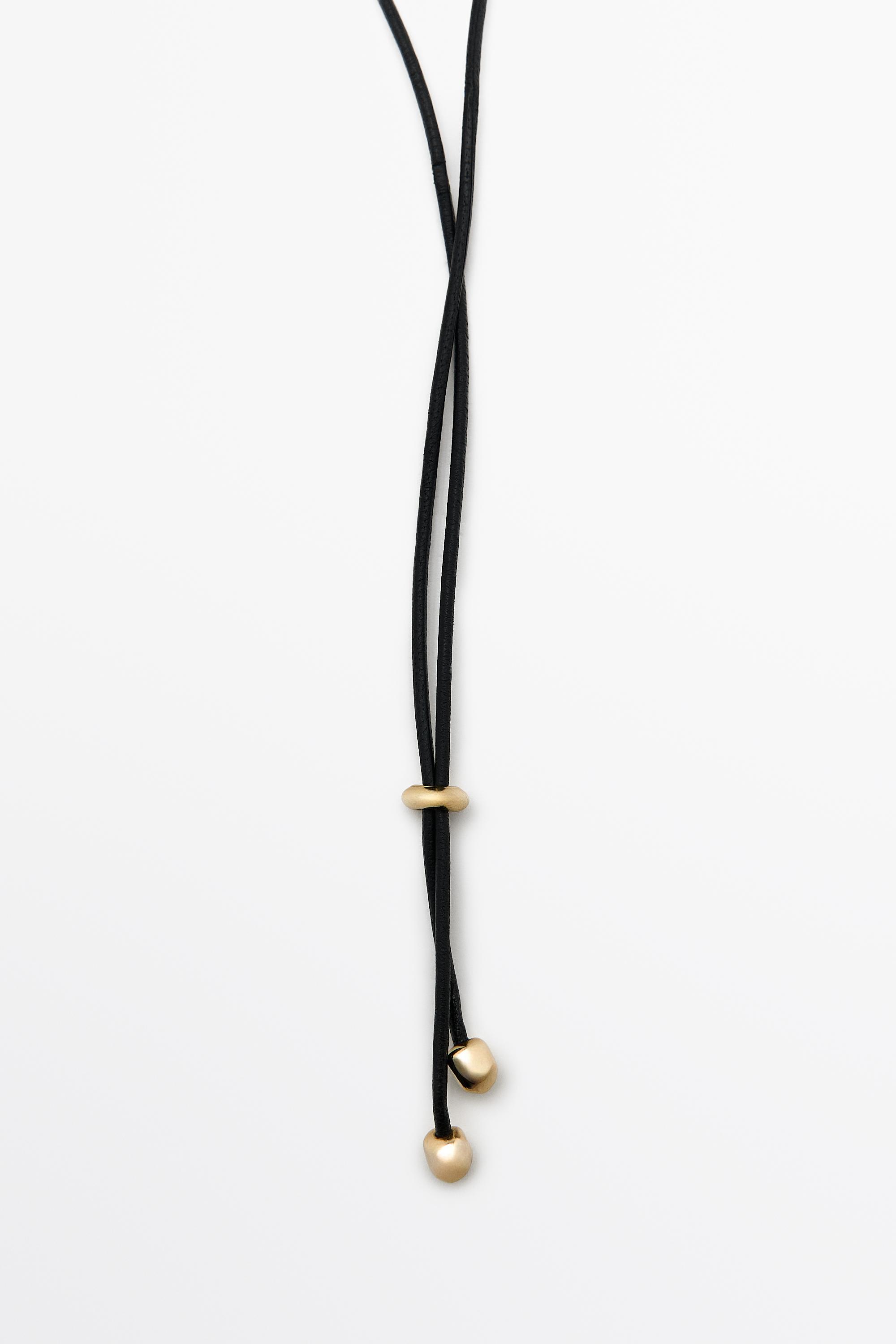 Shell pendant necklace with tassel — GOLDEN