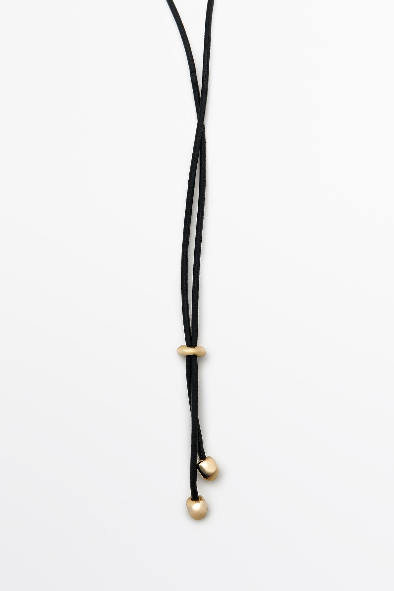 Shell pendant necklace with tassel — GOLDEN