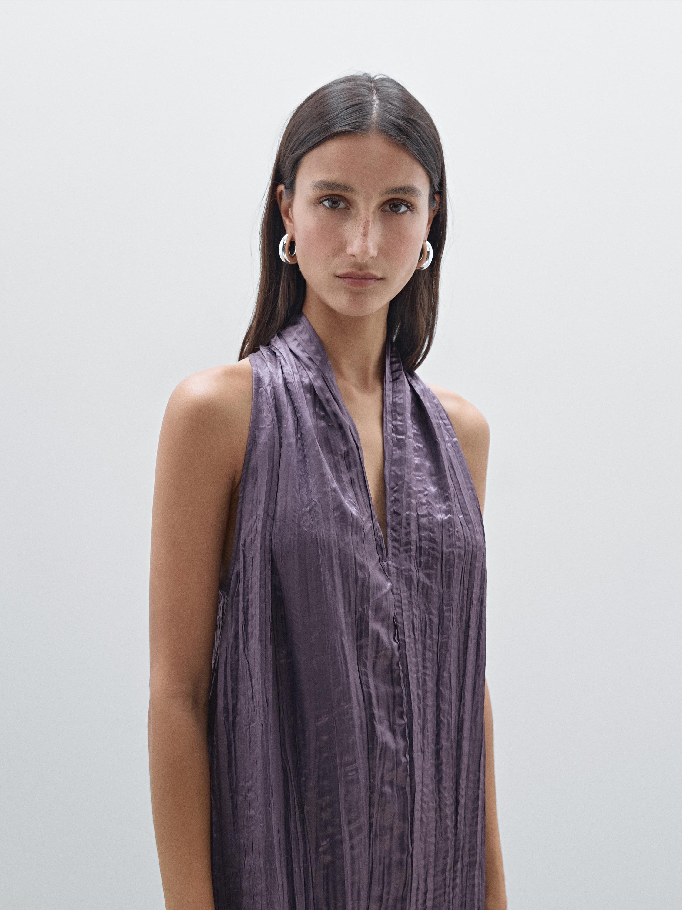 Long pleated halterneck dress