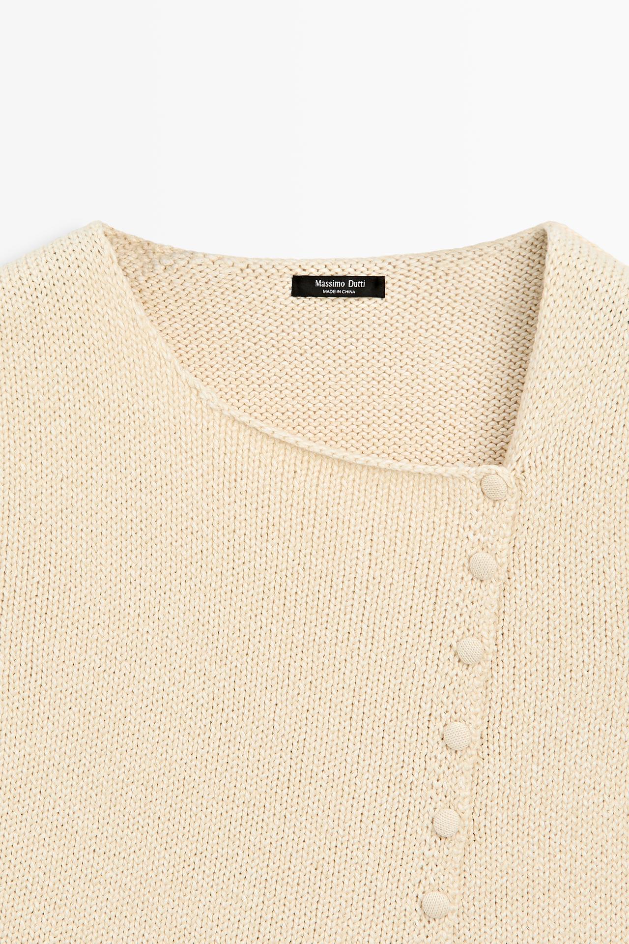 Cotton blend knit top with button detail — CREAM