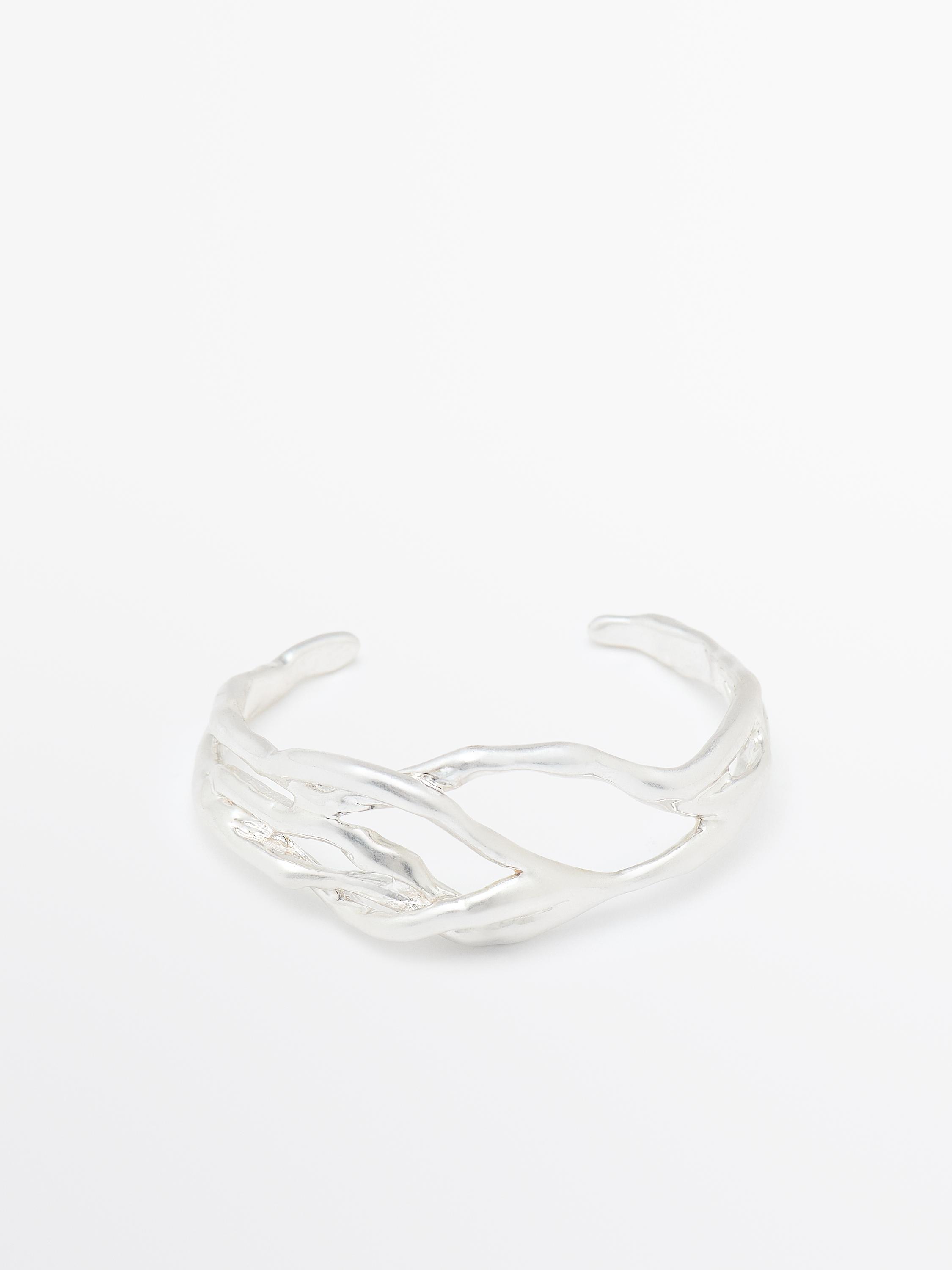 Pulsera metálica abstracta